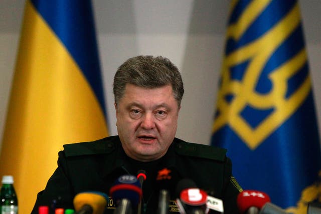 President Petro Poroshenko orders his troops to cease hostilities