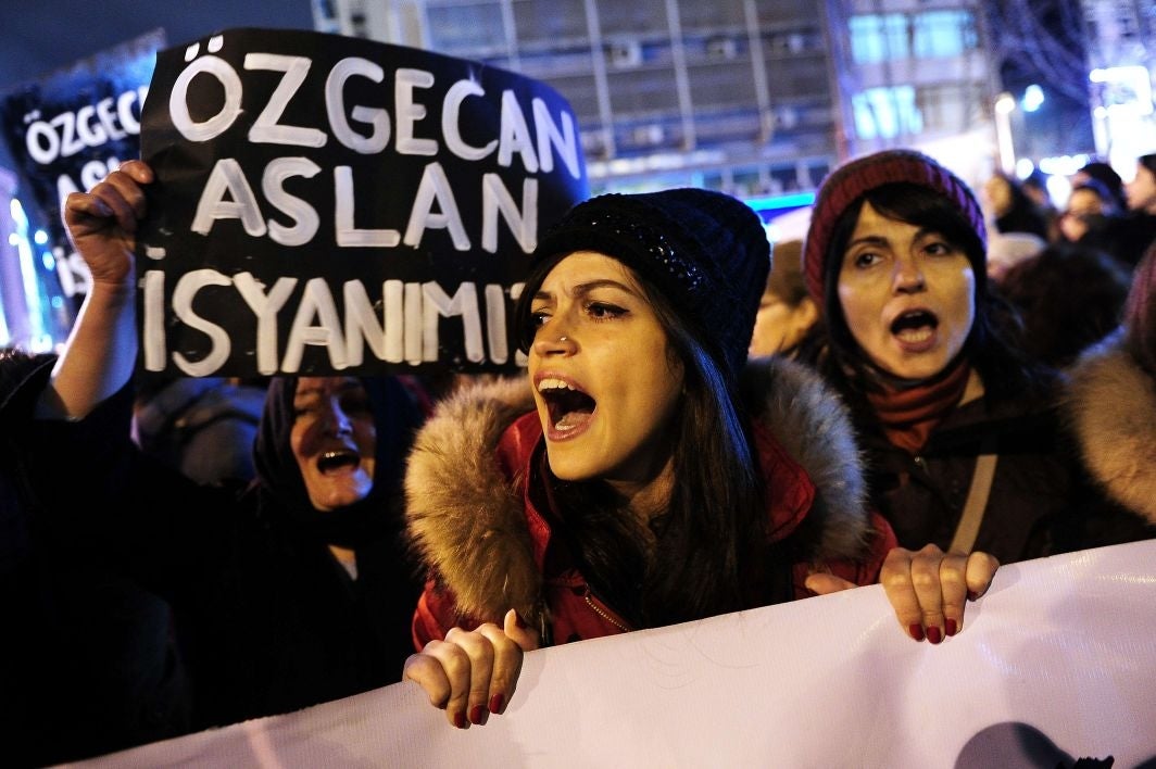 A woman shouts slogans during a demostration in Istanbul