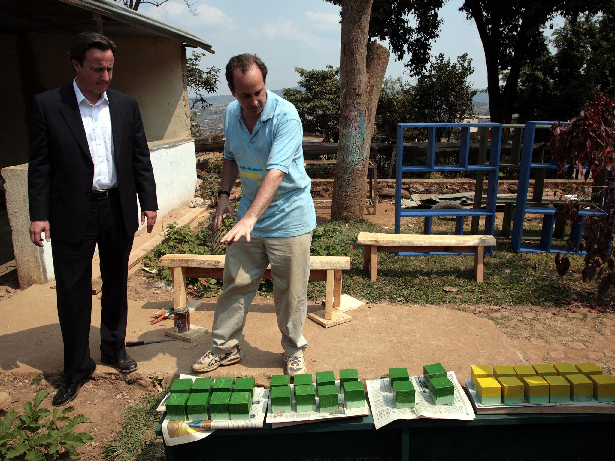 David Cameron, then Leader of the Opposition, during a visit to an orphanage in Rwanda, in 2007. He has repeatedly spoken of his pride that his government has boosted spending on foreign aid