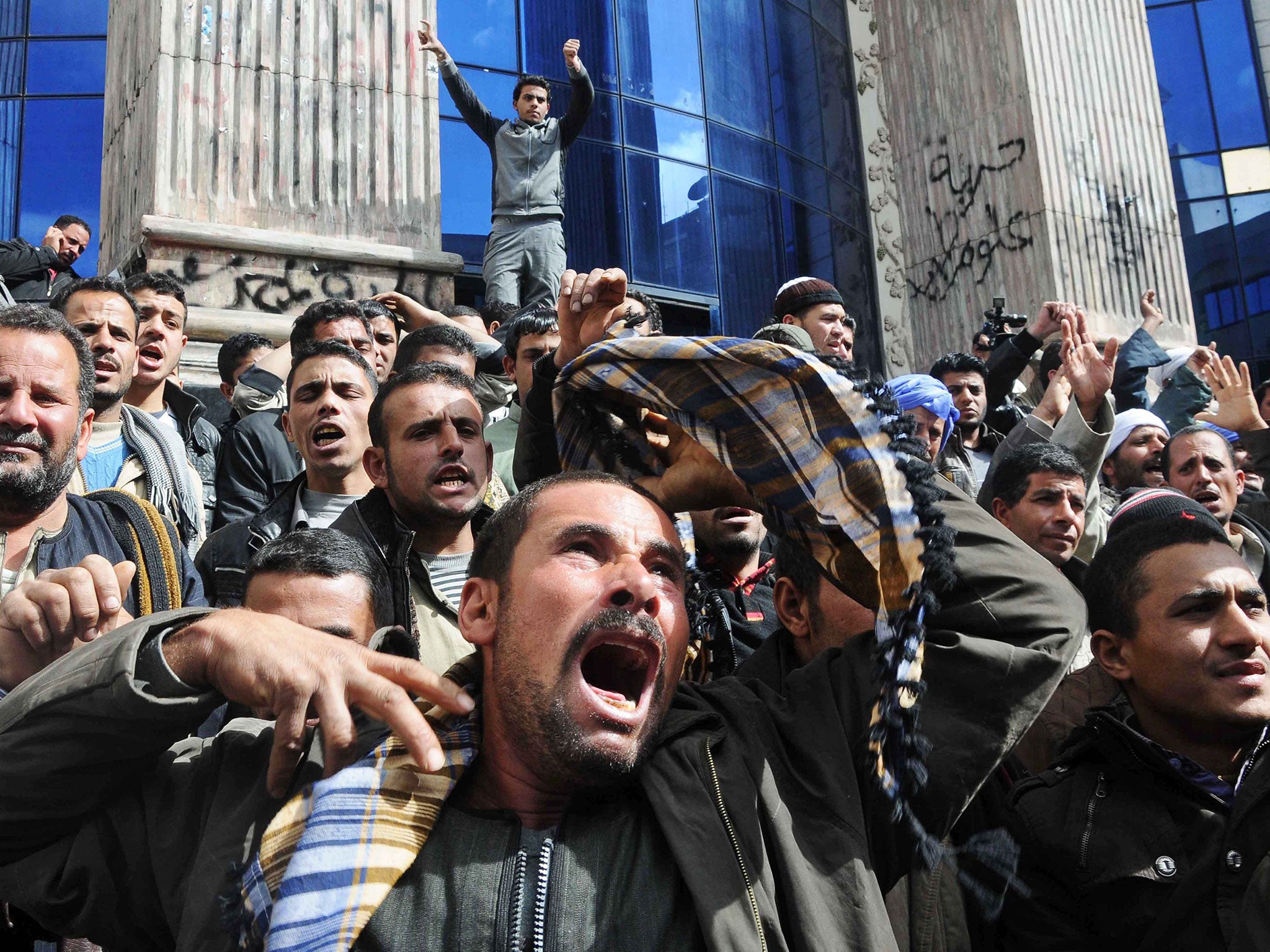 Egyptians protest what they characterise as Government inaction in reaction to the kidnapping of Copts in Libya, Cairo, Egypt, 13 February 2015