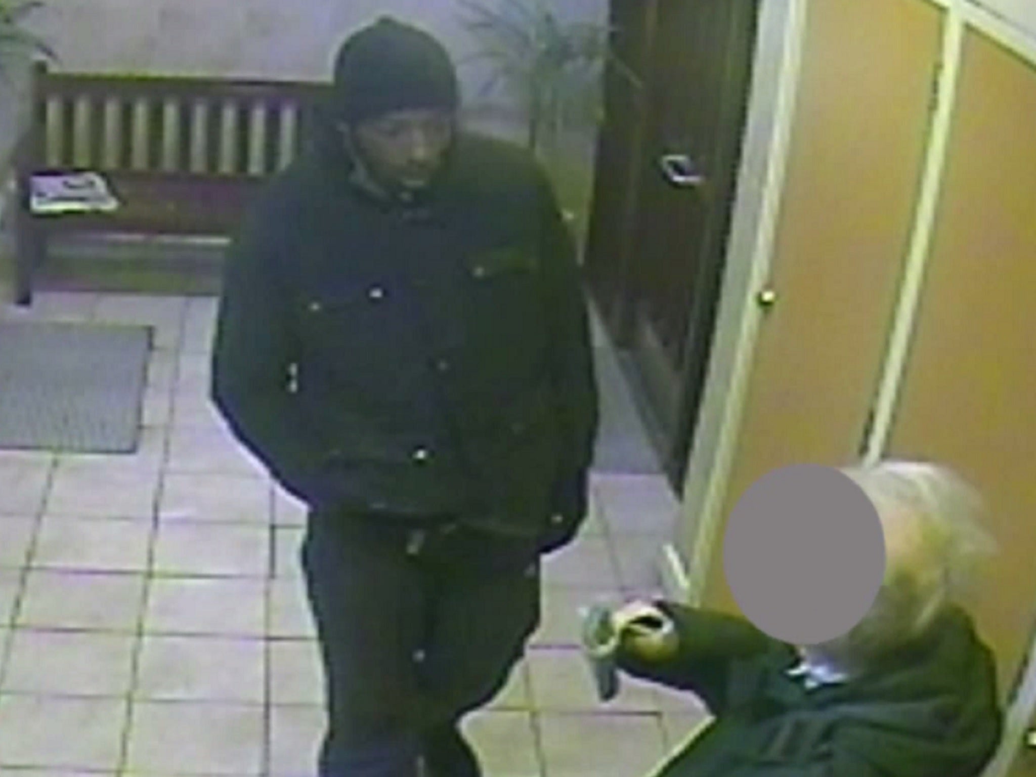 The suspect turns to rob the 92-year-old man before pushing him to the floor