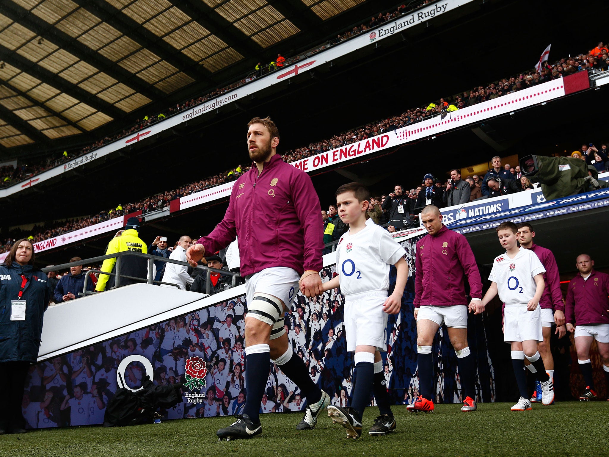 Harry Westlake walks out alongside England captain Chris Robshaw at Twickenham Stadium