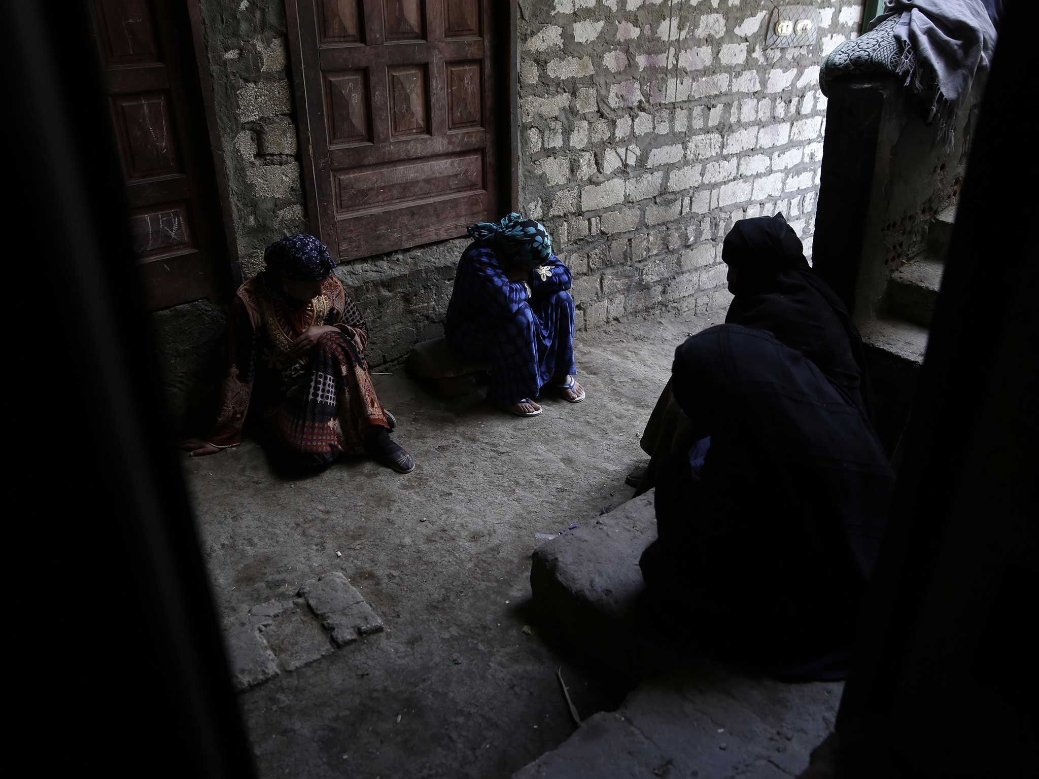 Family members of the victims gather