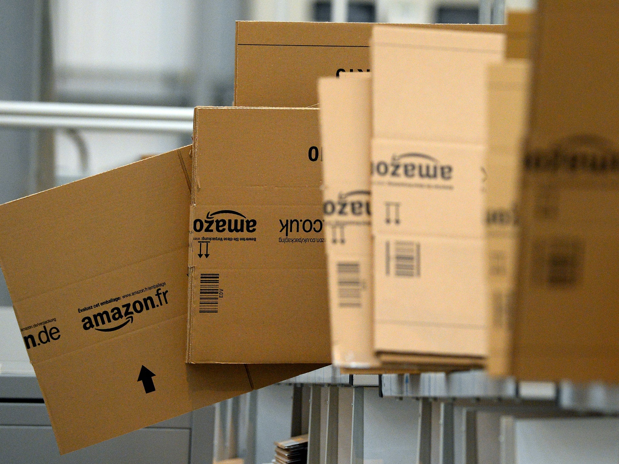 Empty boxes are stacked in the packaging department at the Fulfilment Centre for online retail giant Amazon in Peterborough