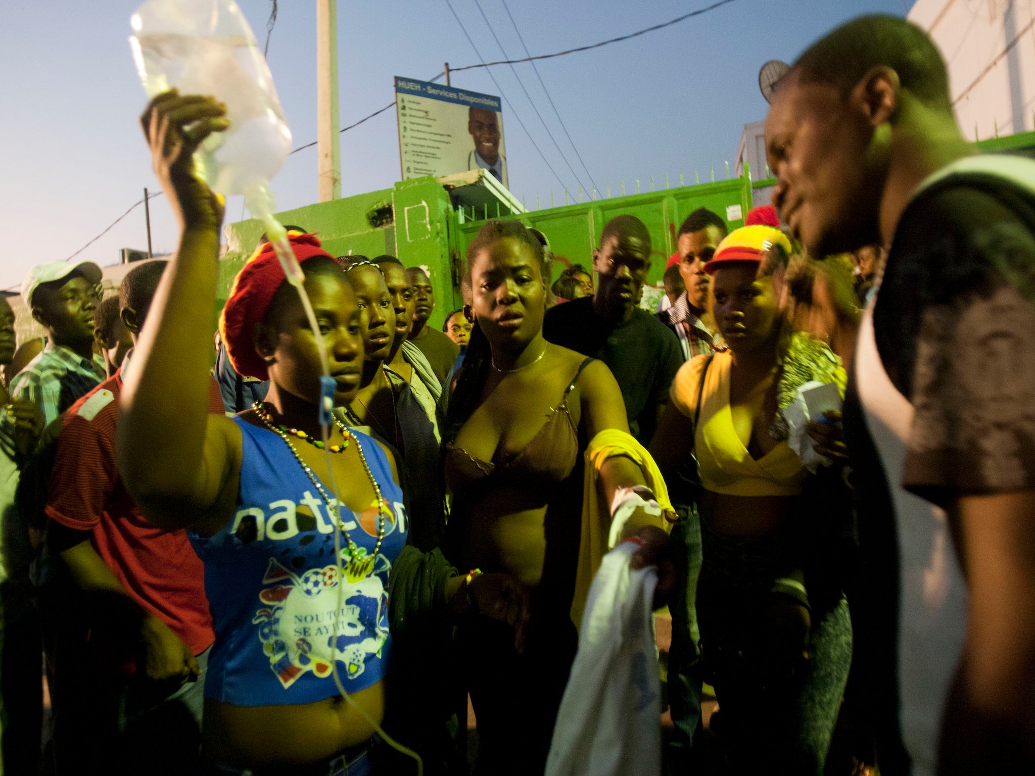 At least 20 people were killed when a float struck a power cable during the Haiti carnival