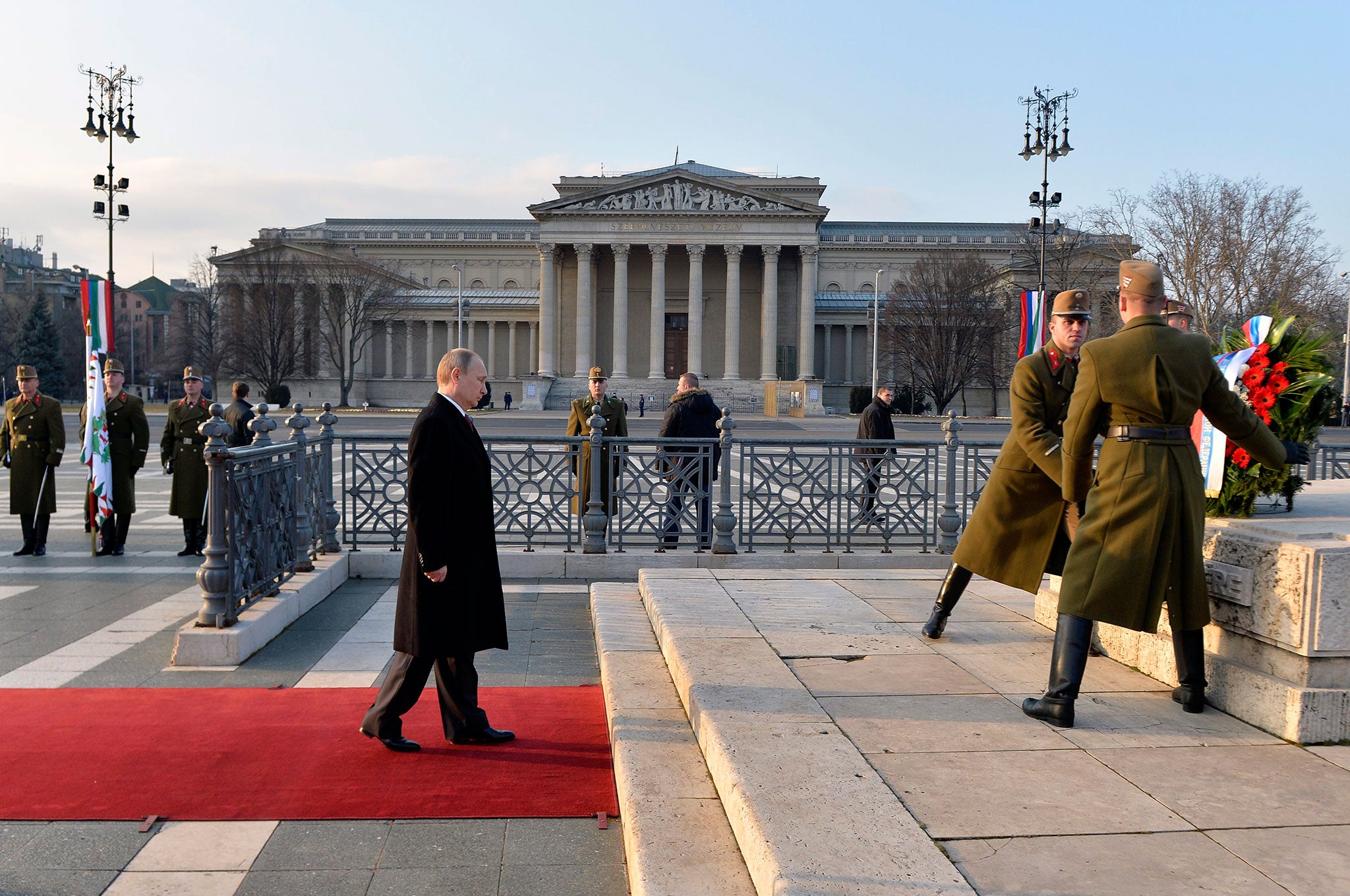 Russian President Vladimir Putin on his way to lay a wreath at the Memorial Stone of Heroes in the Heroes' Square in Budapest, Hungary