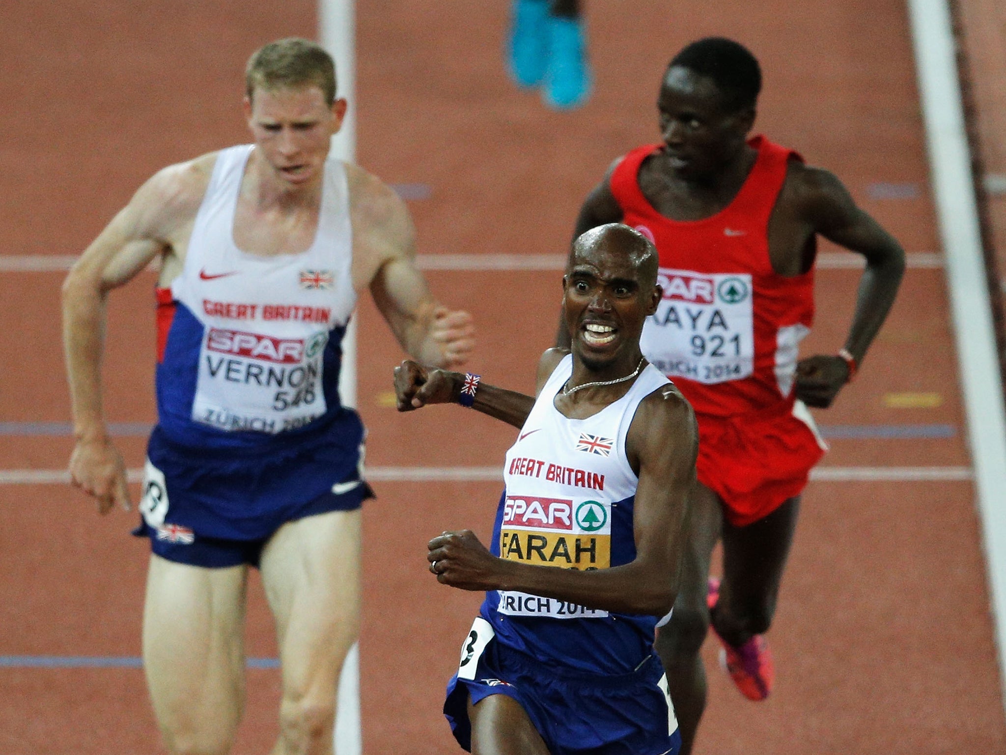 Mo Farah of Great Britain and Northern Ireland celebrates winning gold as Andy Vernon of Great Britain and Northern Ireland (L) wins silver in the Men's 10,000 in Zurich