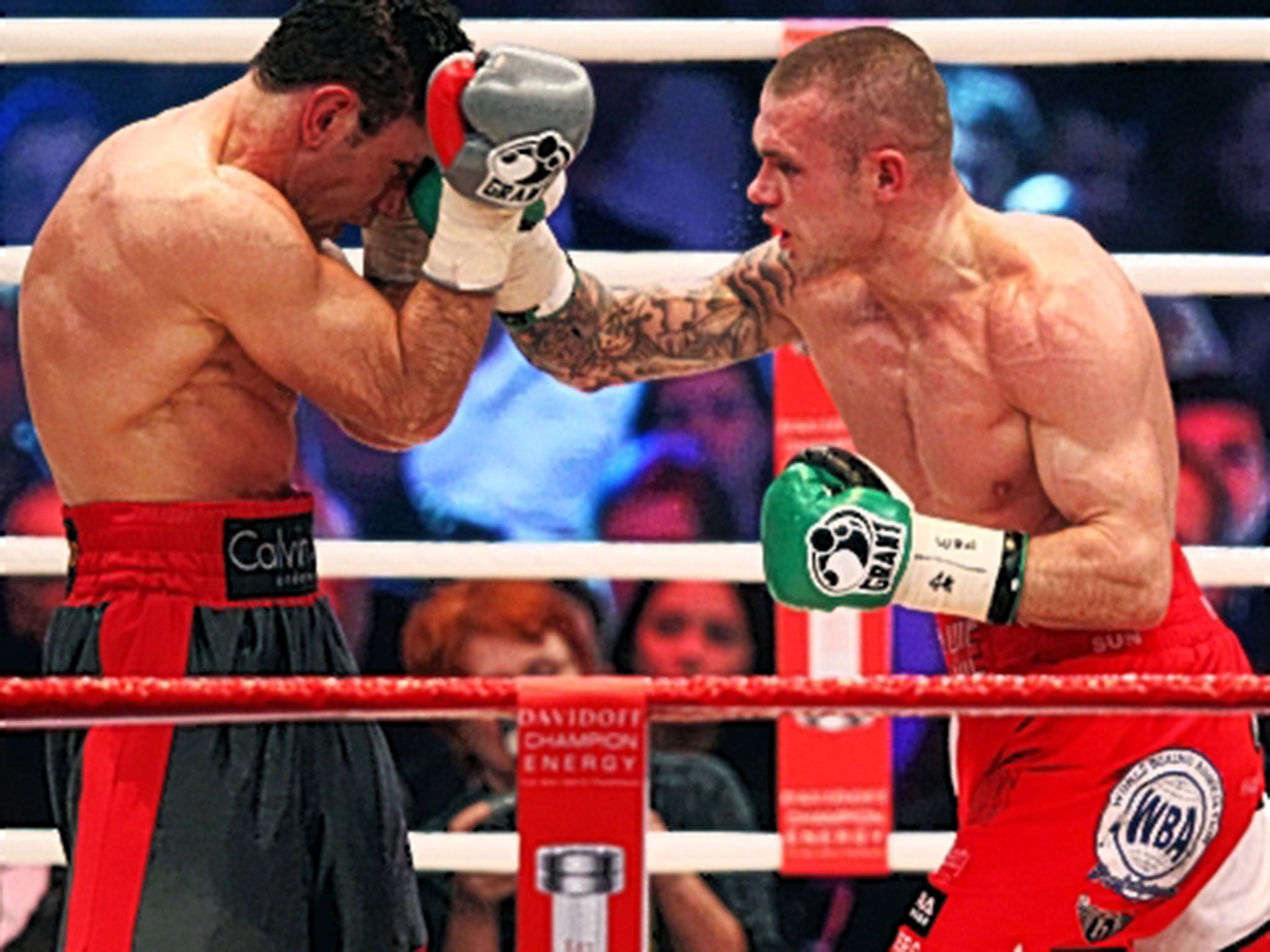 Martin Murray (right) lands a blow on Felix Sturm during their 2011 fight in Germany