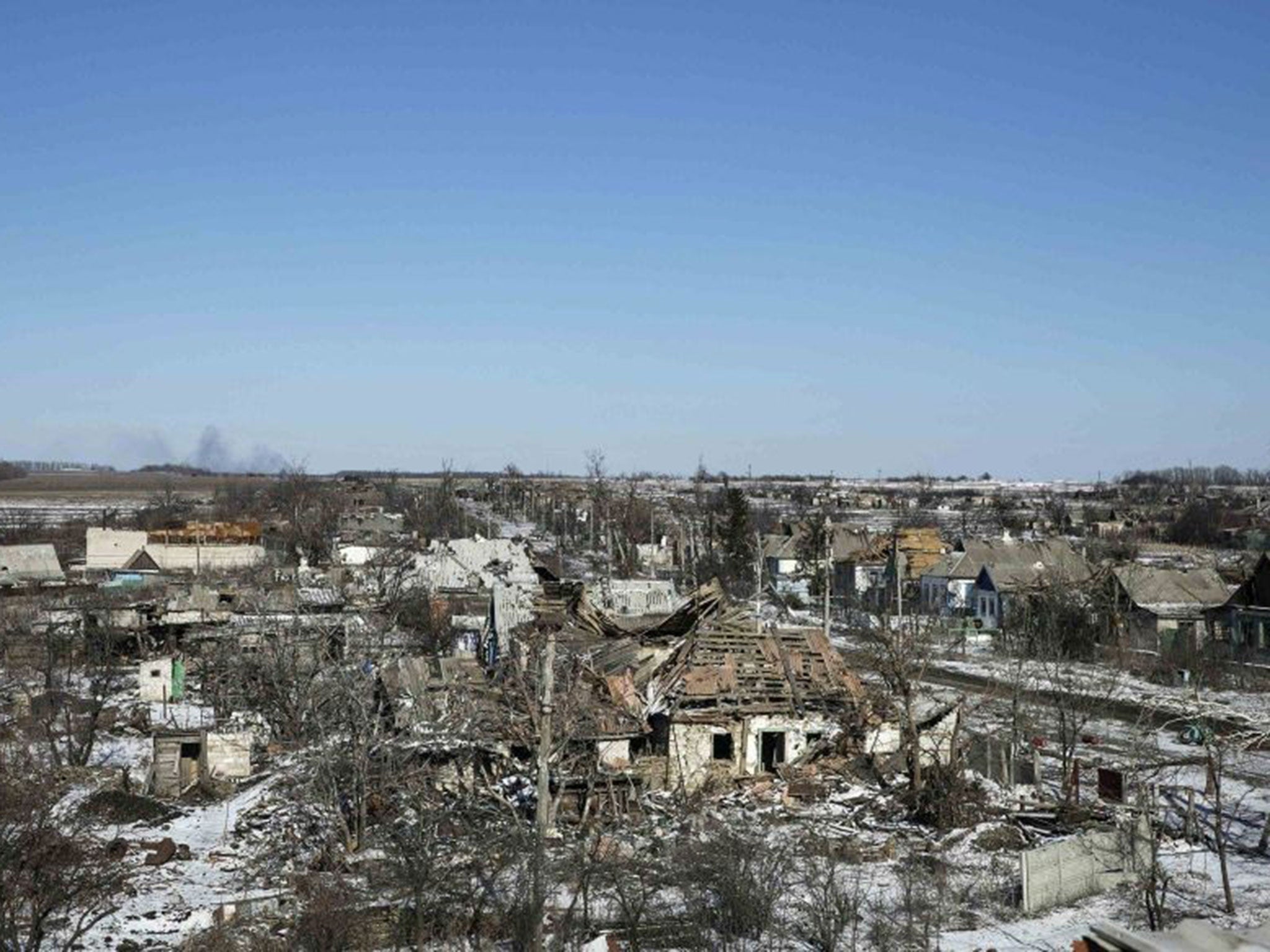 Buildings damaged by fighting are pictured in a village just south of Debaltseve