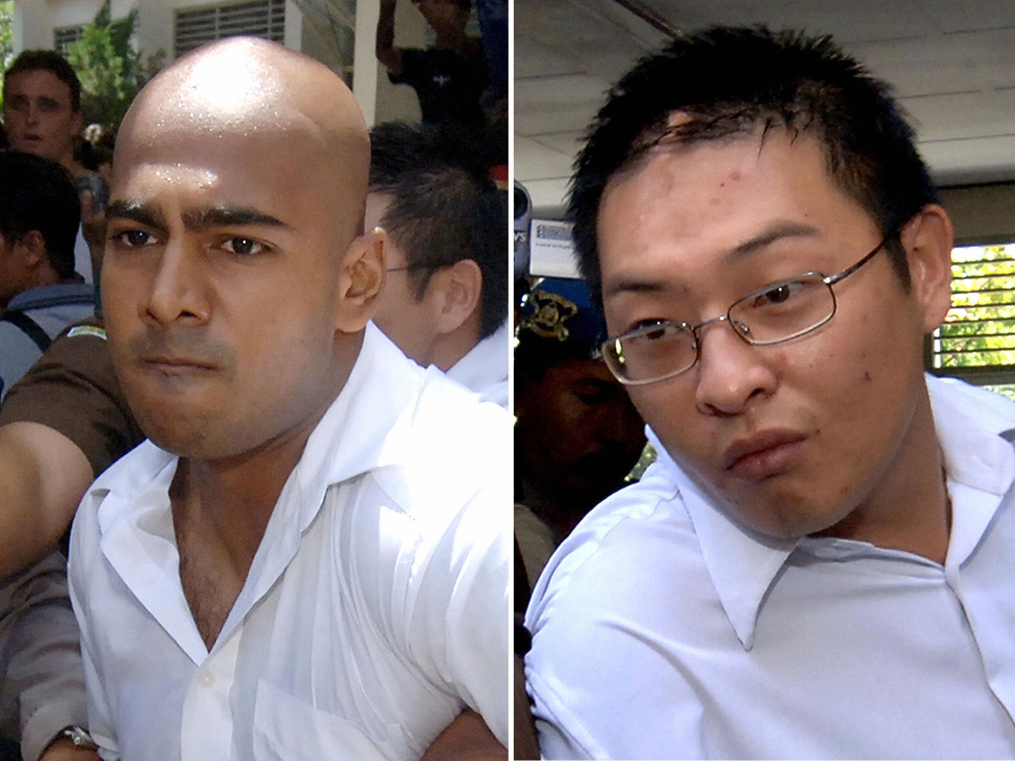 Australians Myuran Sukumaran (left) and Andrew Chan (right), the two ringleaders of the 'Bali Nine' drug ring, pictured being escorted out of court in 2006. 14 February 2006. The Indonesian court issued death sentences for Australian's Chan and Sukumaran