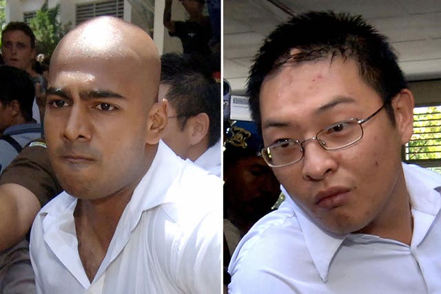 Australians Myuran Sukumaran (left) and Andrew Chan (right), the two ringleaders of the 'Bali Nine' drug ring, pictured being escorted out of court in 2006.  14 February 2006. The Indonesian court issued death sentences for Australian's Chan and Sukumaran