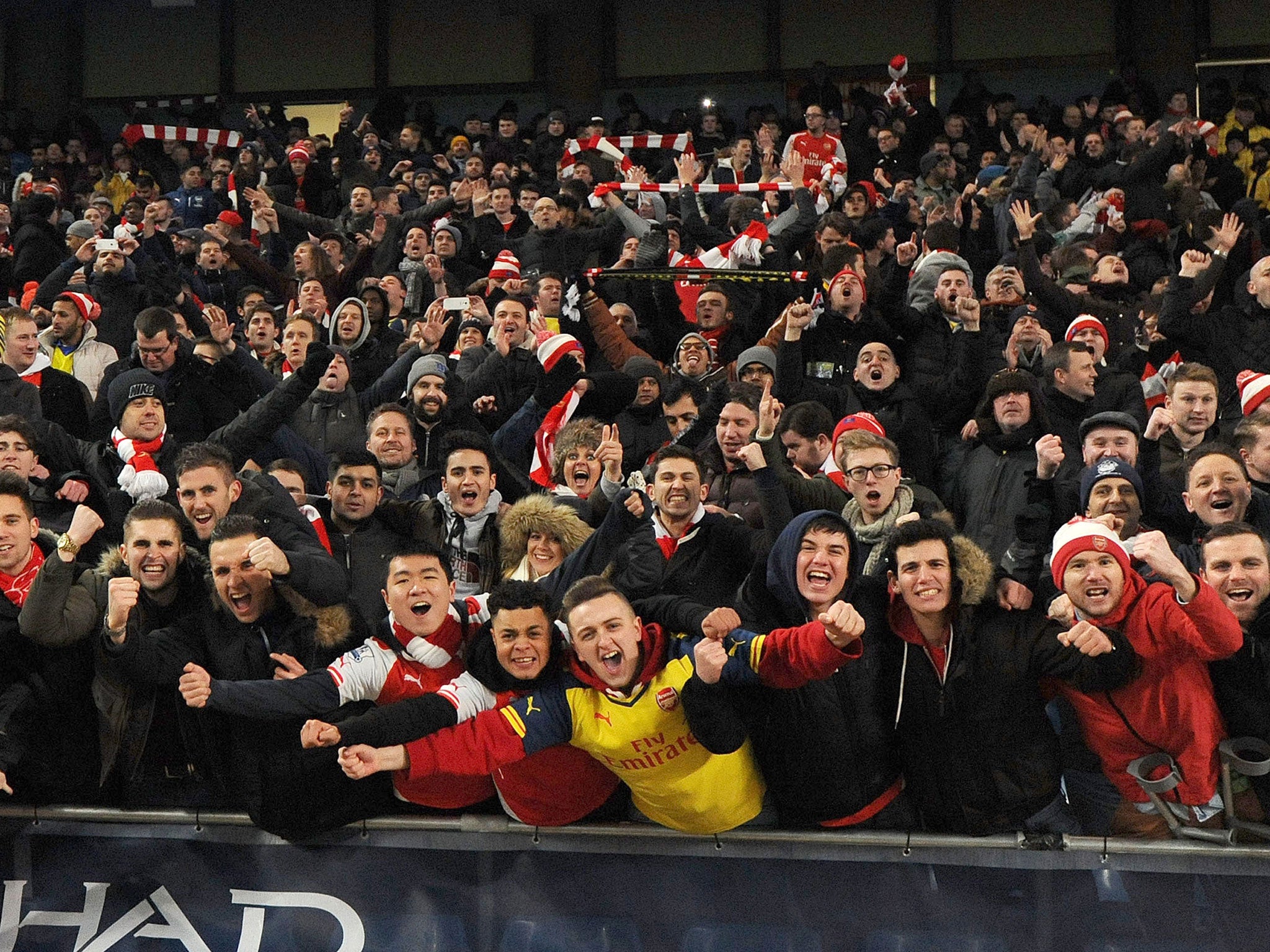 Arsenal supporters celebrate the win over Manchester United's rivals, Manchester City, at the Etihad Stadium back in January