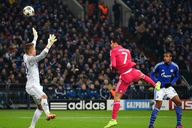 Cristiano Ronaldo scores the opening goal against Schalke