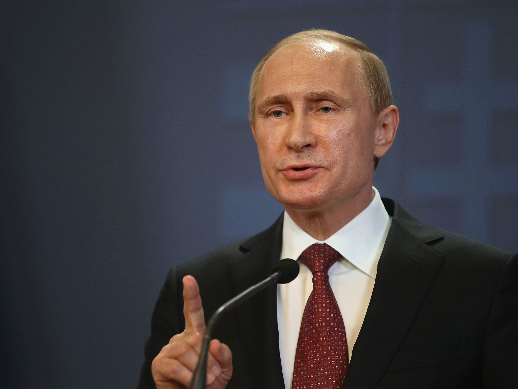 Mr Putin says the currency would help member states' economies