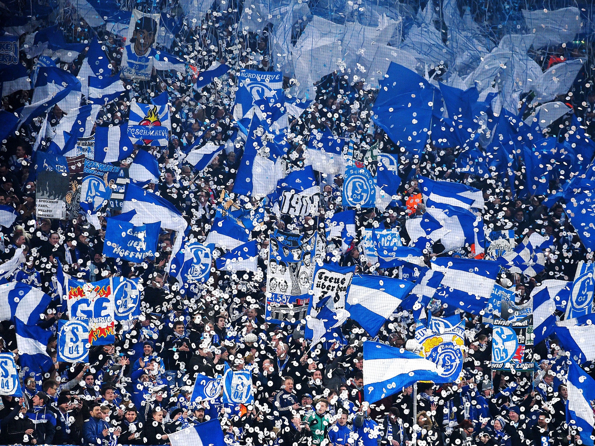Schalke fans cheer on the team ahead of their Champions League clash with Real Madrid