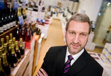 Majestic Wine shows chief executive Steve Lewis the door
