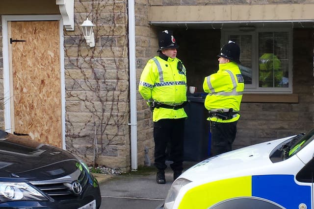 Police outside a house in Tameside following the arrest of two teenagers on counter-terrorism investigations