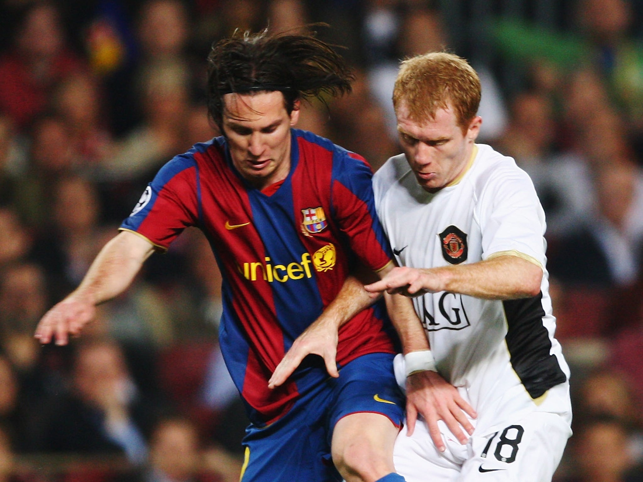 Lionel Messi and Paul Scholes in 2008