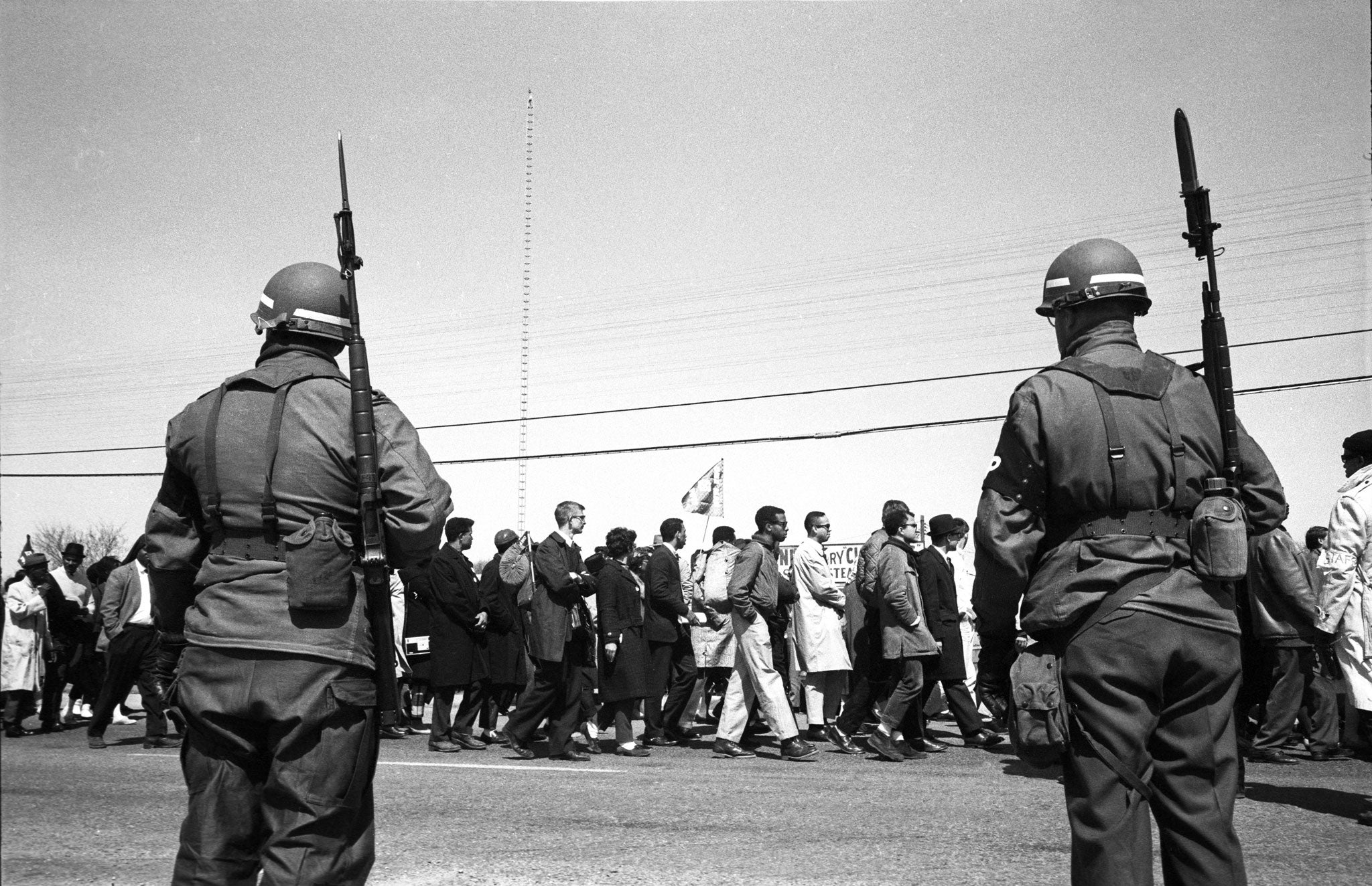 The Alabama National Guard lines the route, federalised by President Johnson to protect the marchers