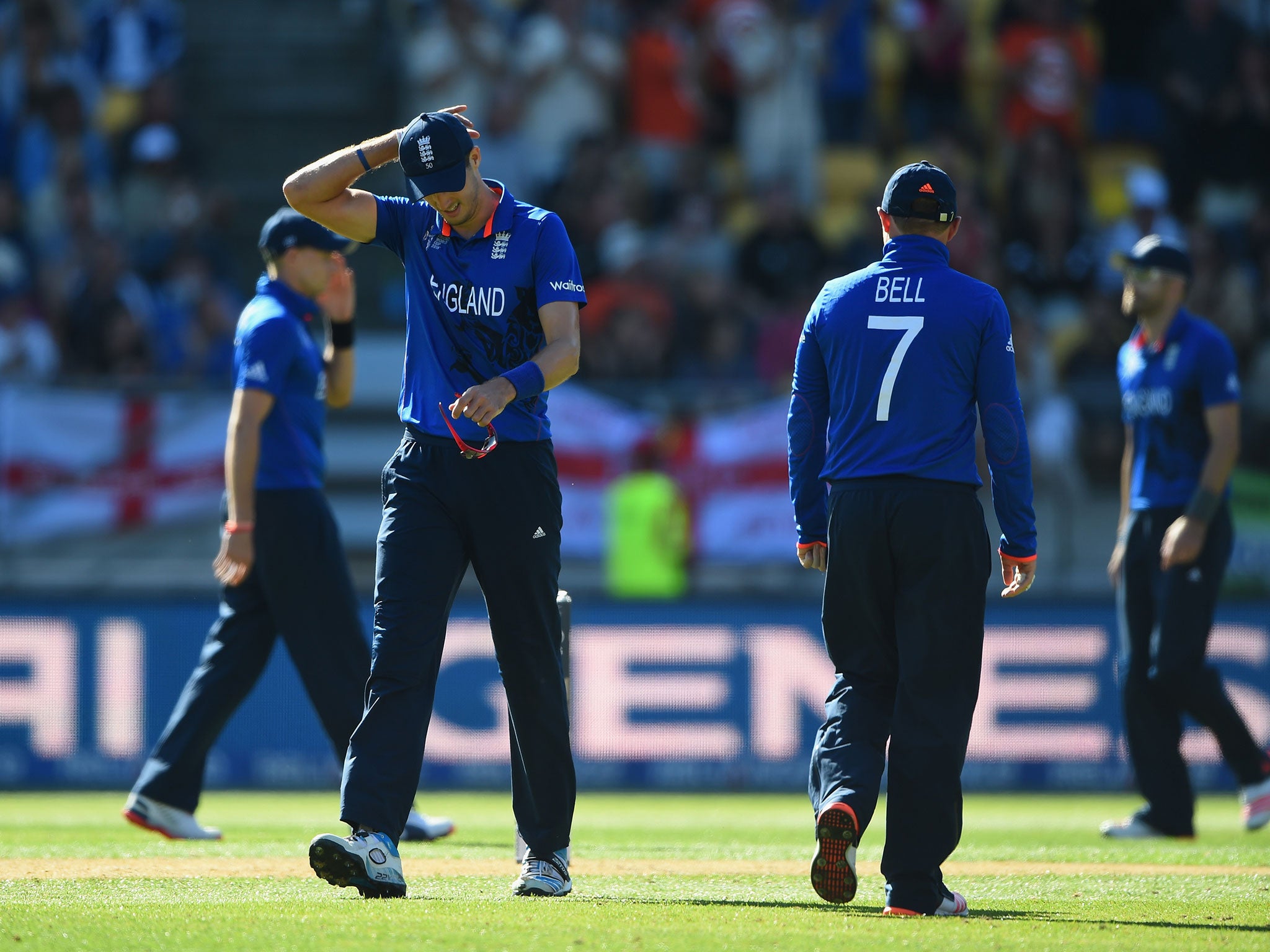 Steven Finn appears dejected after his two overs were smashed for 49 runs