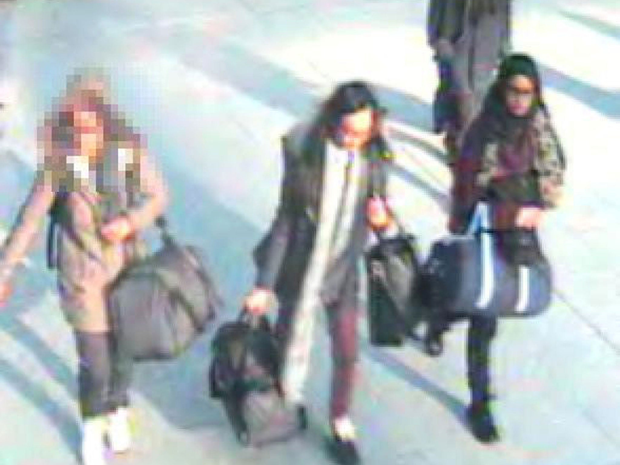 CCTV show the un-named 15-year-old, Kadiza Sultana,16, and Shamima Begum,15, at Gatwick airport