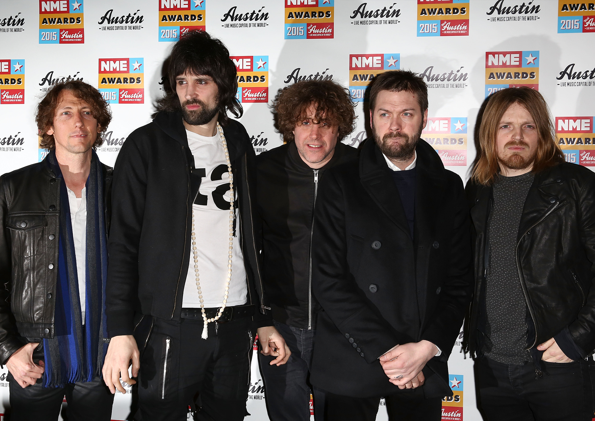 Check these cool guys out: Kasabian line up at this year's NME Awards
