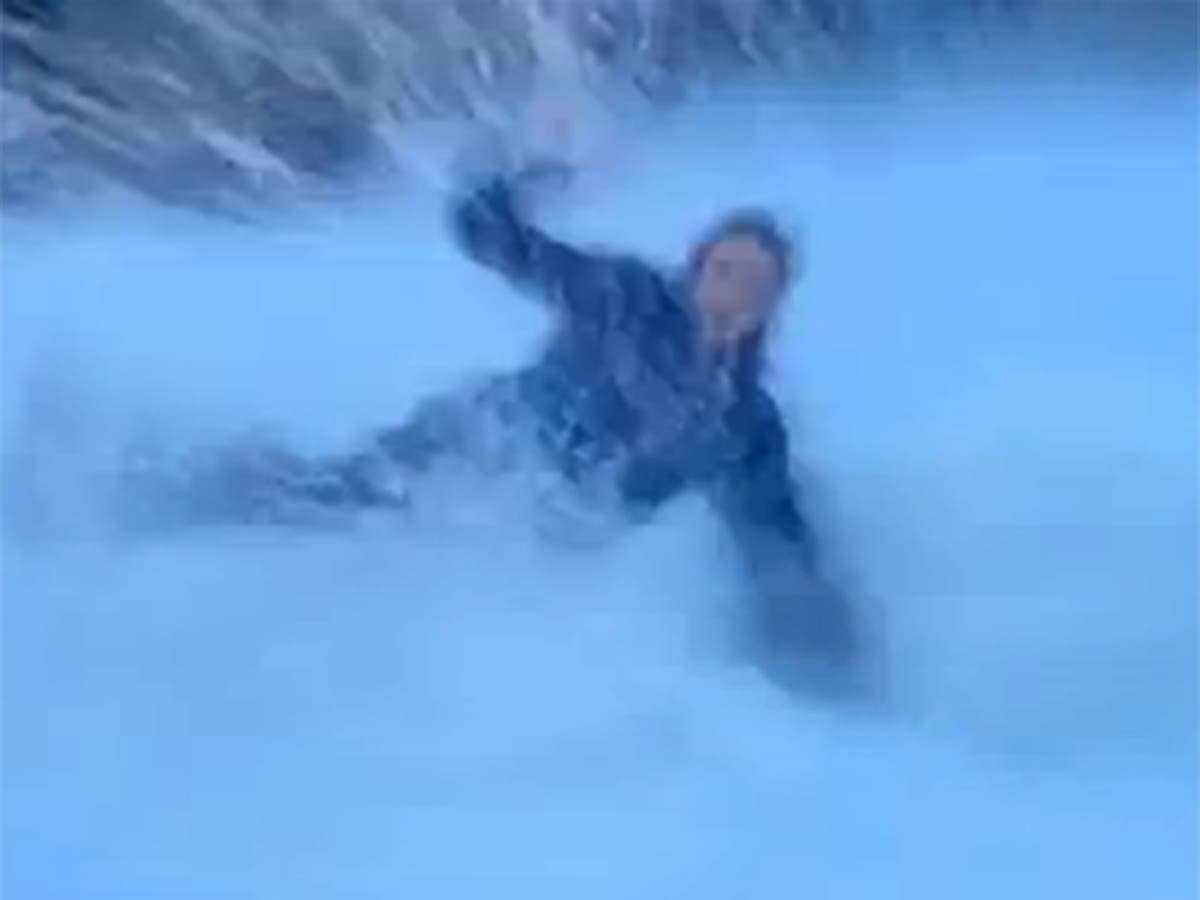 video-french-reporter-swept-off-her-feet-by-giant-wave-live-on-tv