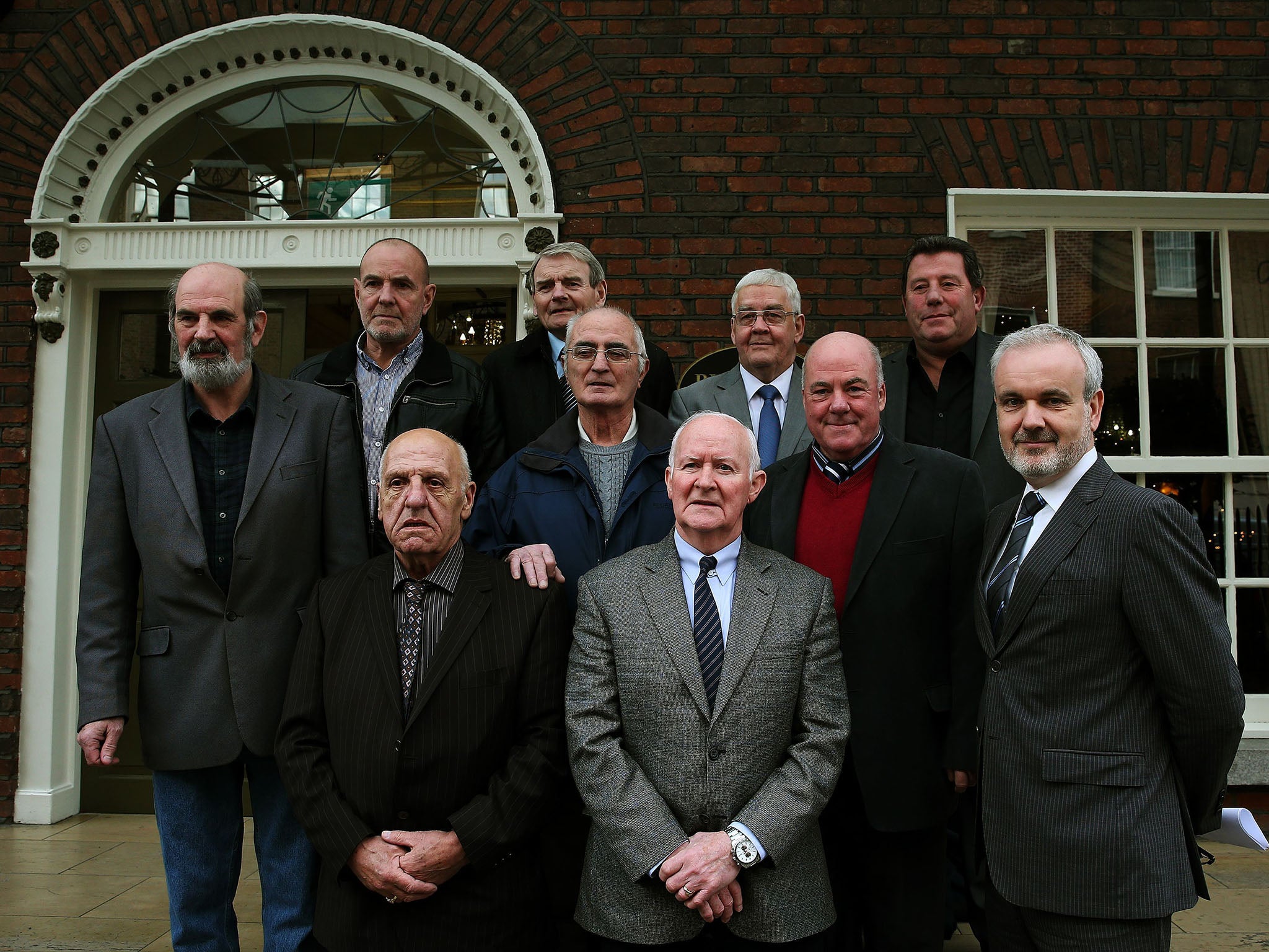 Colm O'Gorman, executive director of Amnesty International Ireland, (front right) with a number of the surviving 'Hooded Men' (front row from left) Michael Donnelly, and Liam Shannon, (middle row from left) Kevin Hannaway, Gerry McKerr, and Jim Auld, (bac