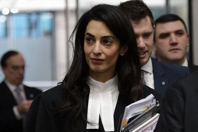 Amal Clooney has joined the legal team defending  'The Hooden Men'