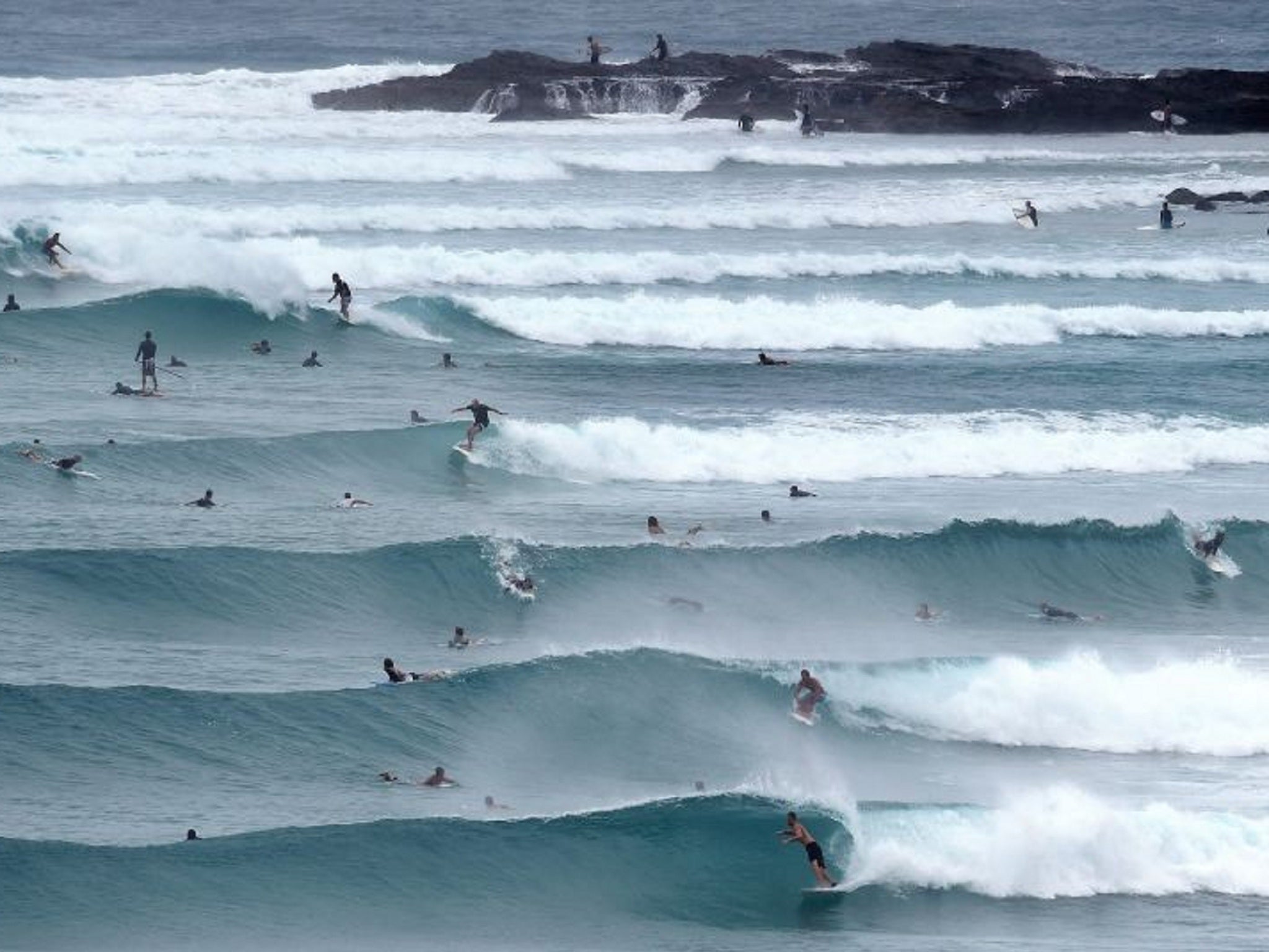 Surfers out in full-force during Cyclone Marcia in Australia