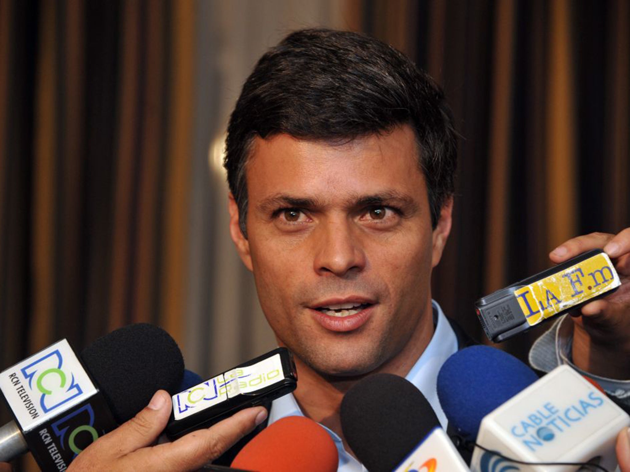 Leopoldo Lopez surrendered himself to the authorities after they accused him of fomenting street riots that were to lead to 43 deaths