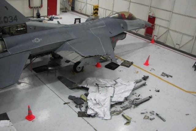 The student's F16 jet had five feet shorn off the right wing in the crash. 