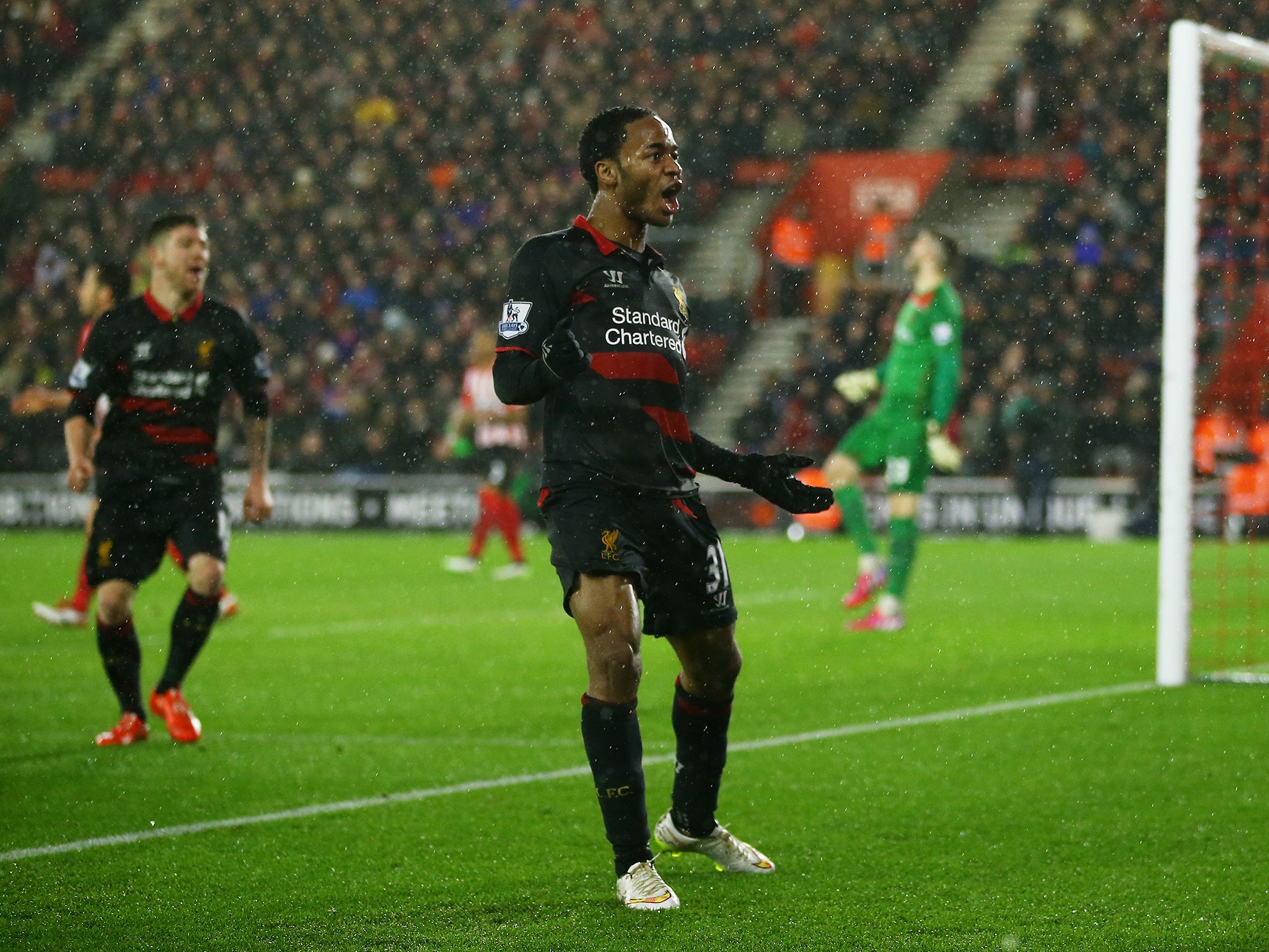 Raheem Sterling celebrates his goal