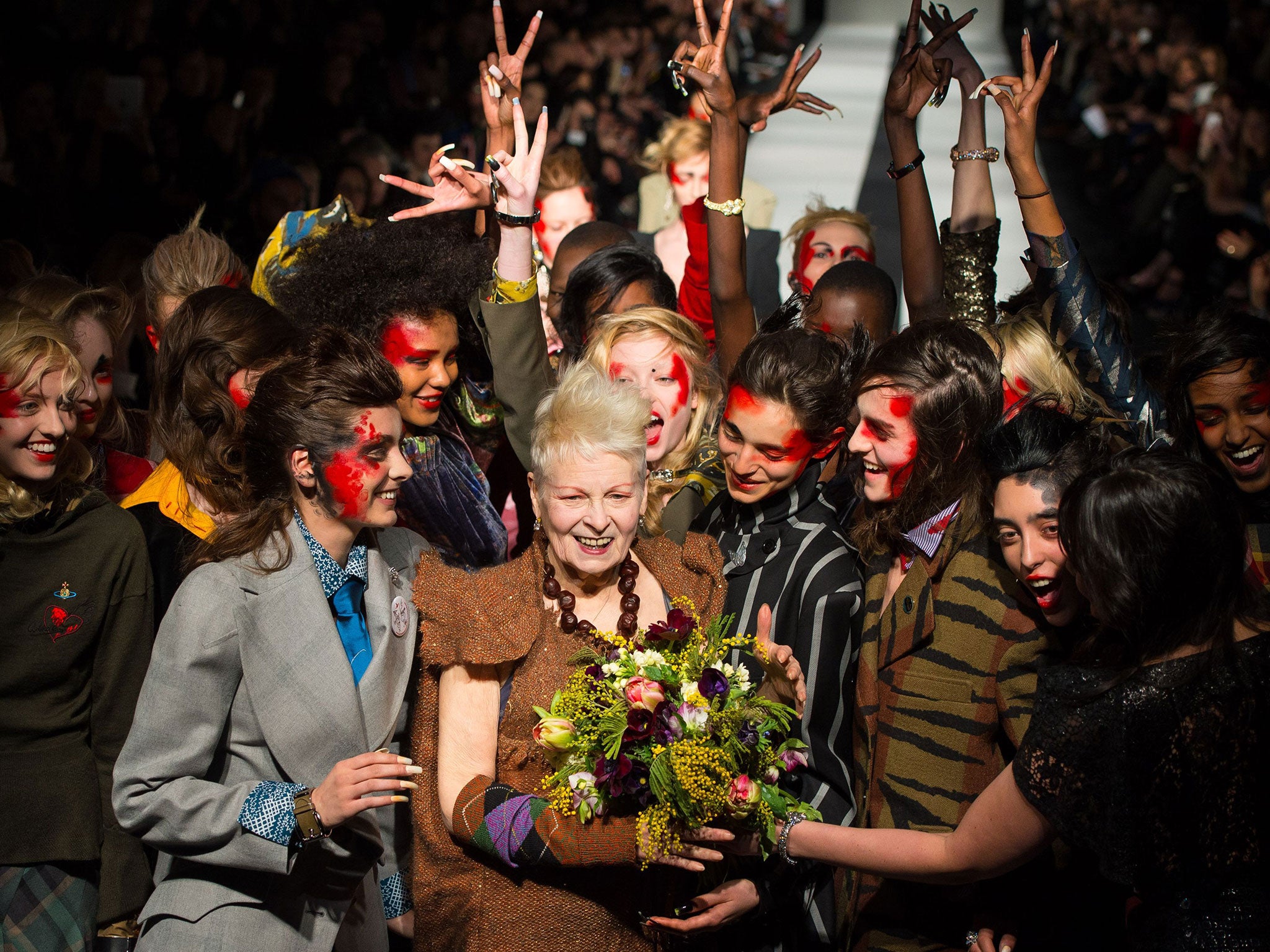 Dame Vivienne Westwood with her models on the catwalk