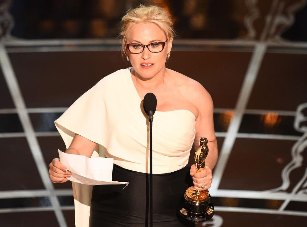 Winner for Best Supporting Actress Patricia Arquette accepts her award on stage at the 87th Oscars February 22, 2015 in Hollywood, California