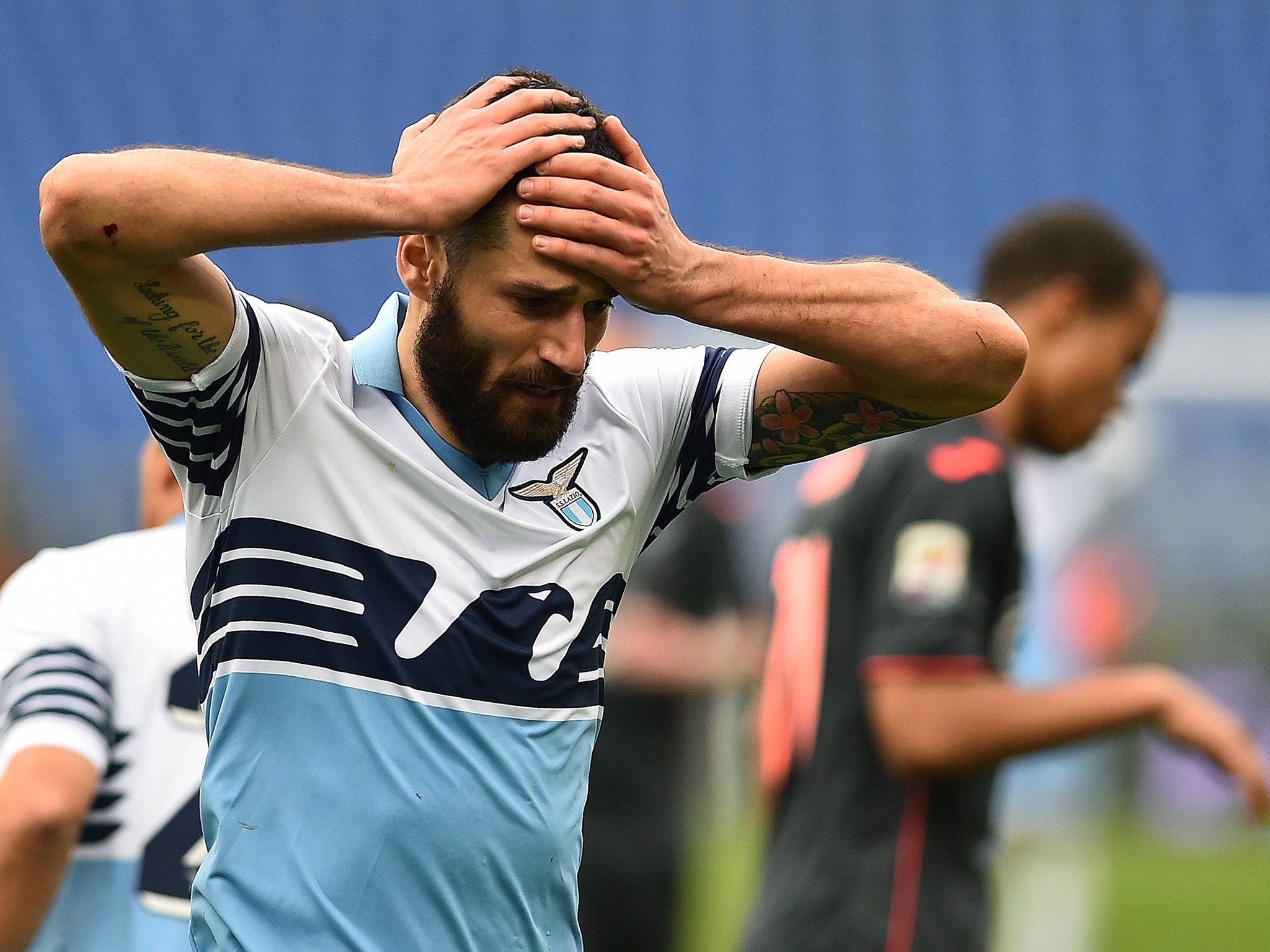 Antonio Candreva after sliding into hoardings in celebration