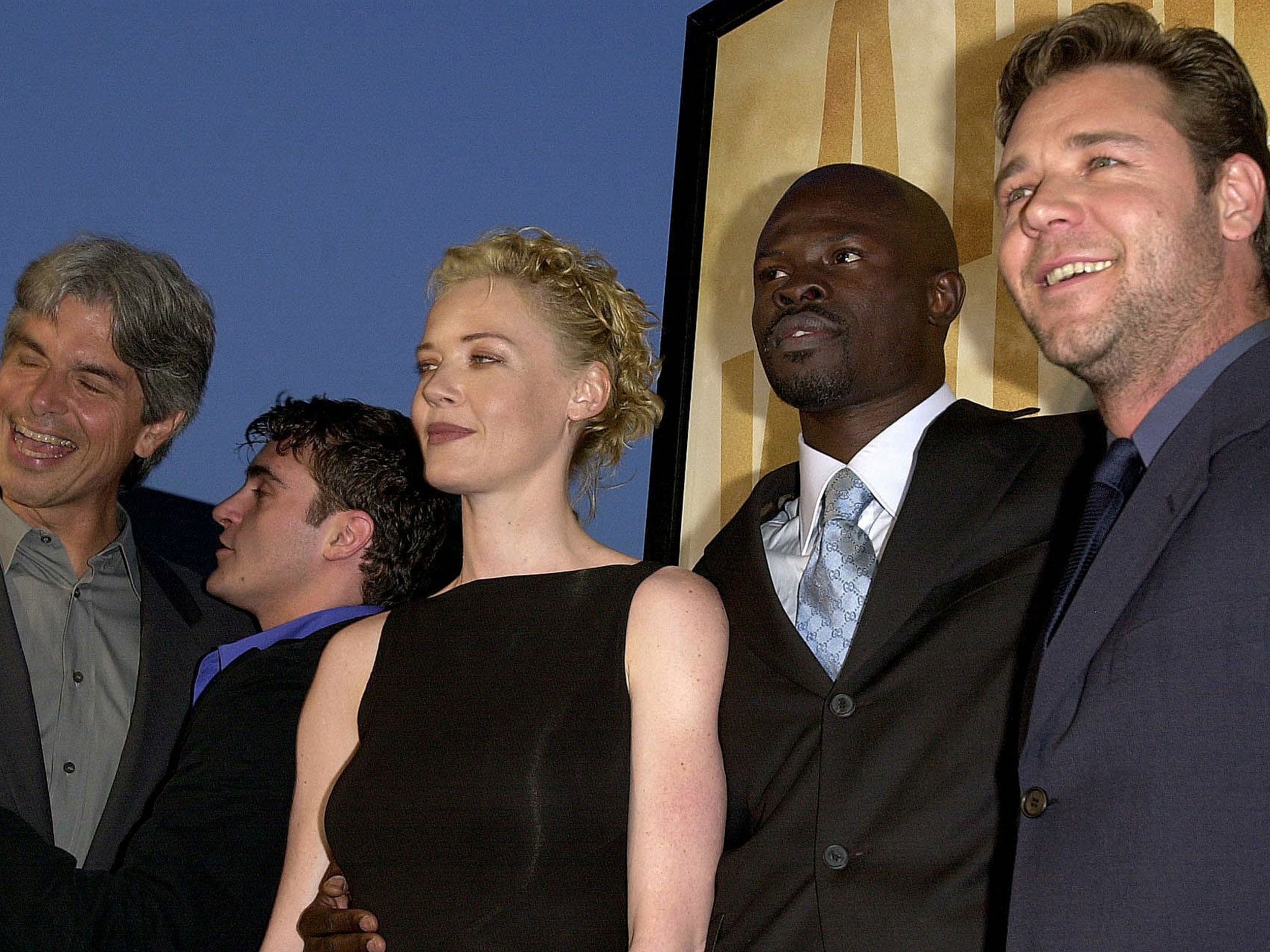 The cast of the film Gladiator at the premiere in 2000 which included both Hounsou (second right) and Crowe (right)