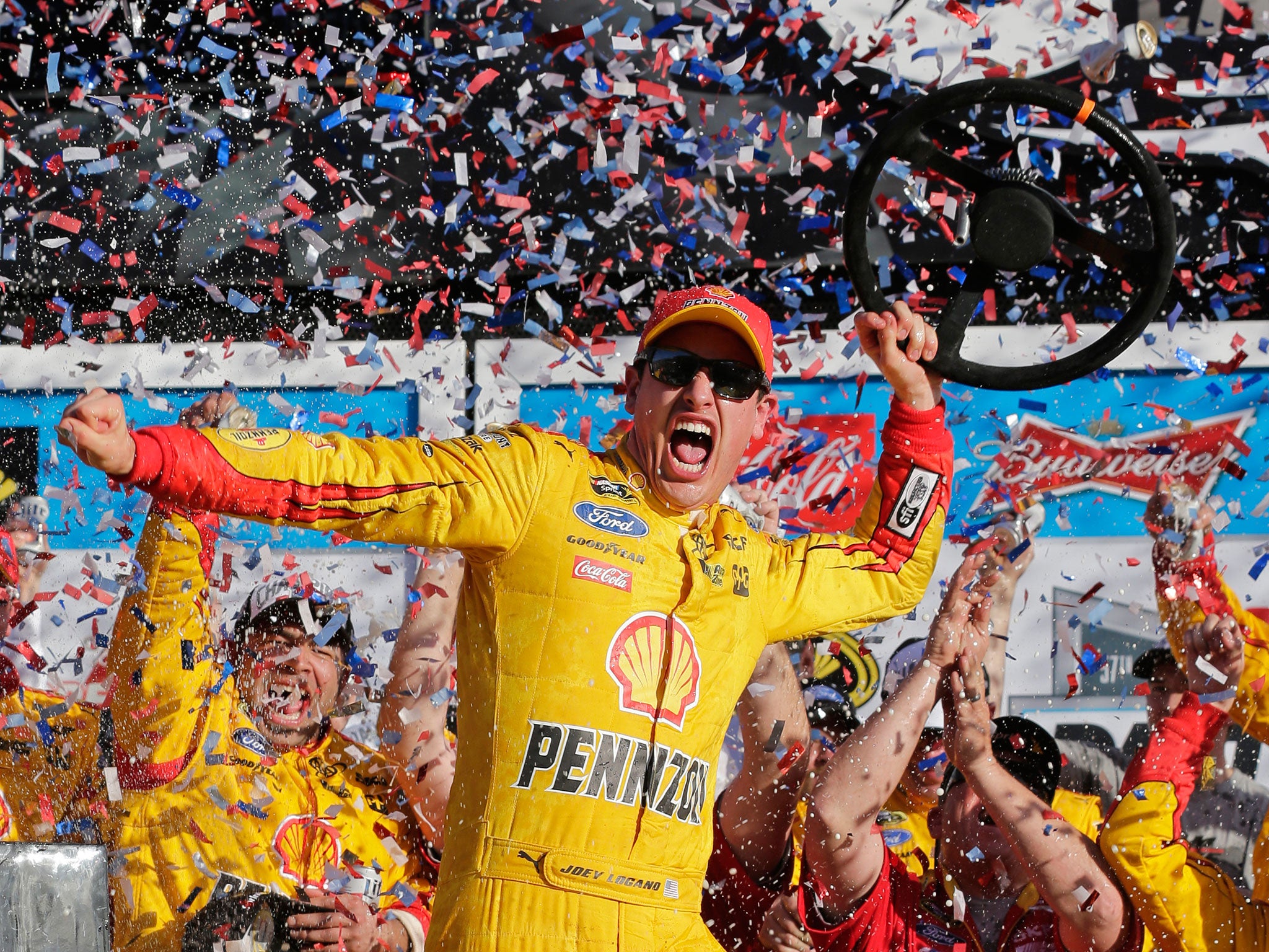 Logano celebrates in Victory Lane after winning the Daytona 500