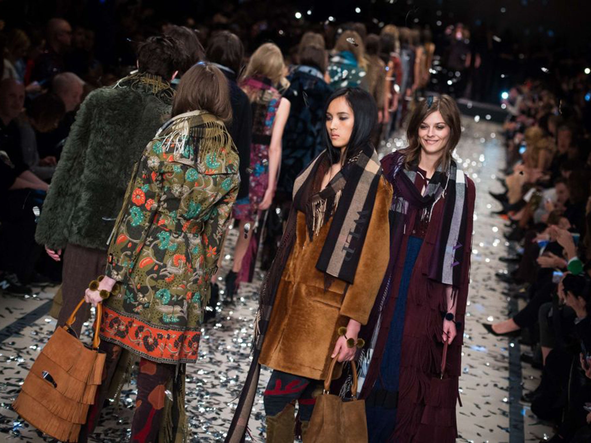 Models wearing clothes from the Burberry Prorsum collection during the company’s 2015 autumn/winter London Fashion Week show