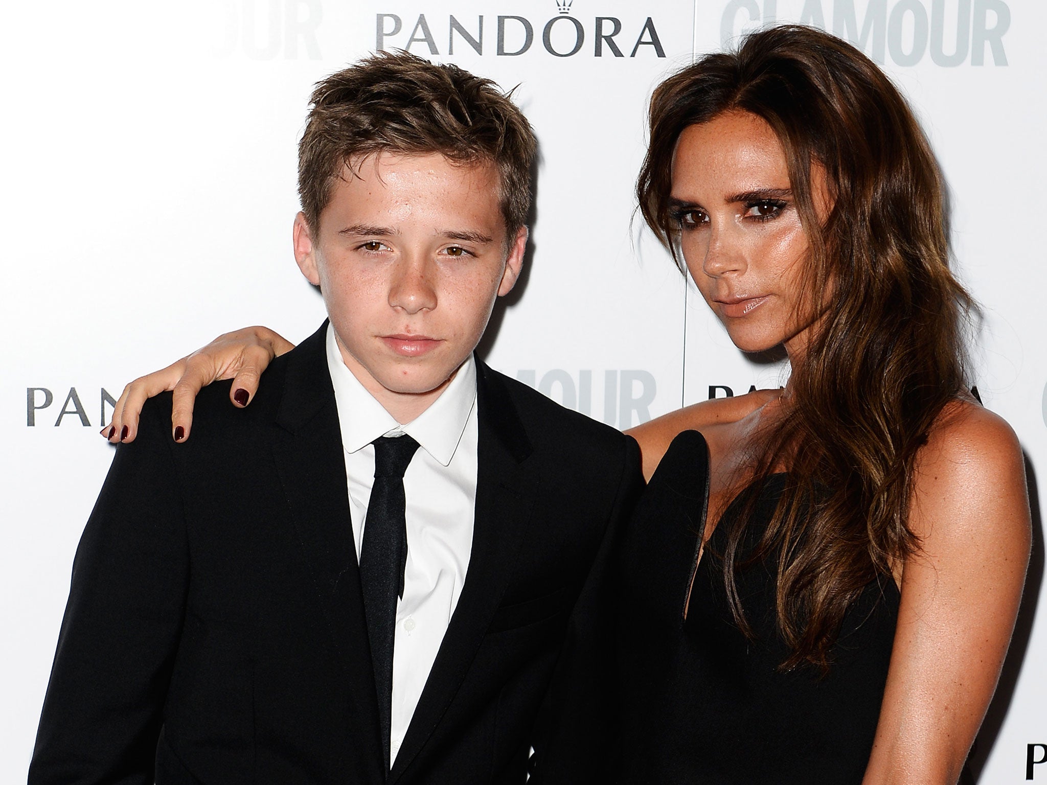 Brooklyn Beckham with his mother Victoria Beckham in June 2013