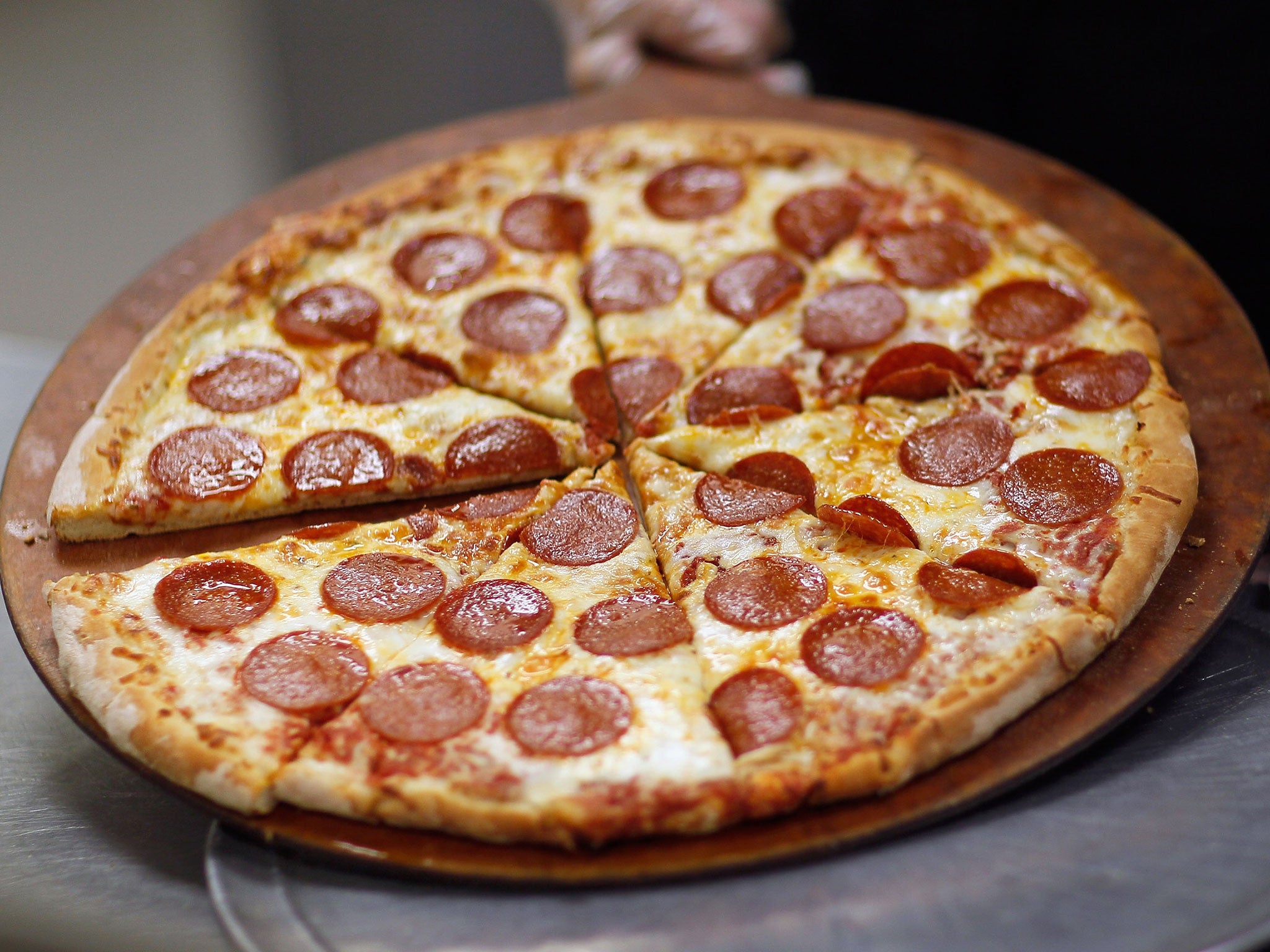 Swiss franc surge leads to officials blocking pizza deliveries from