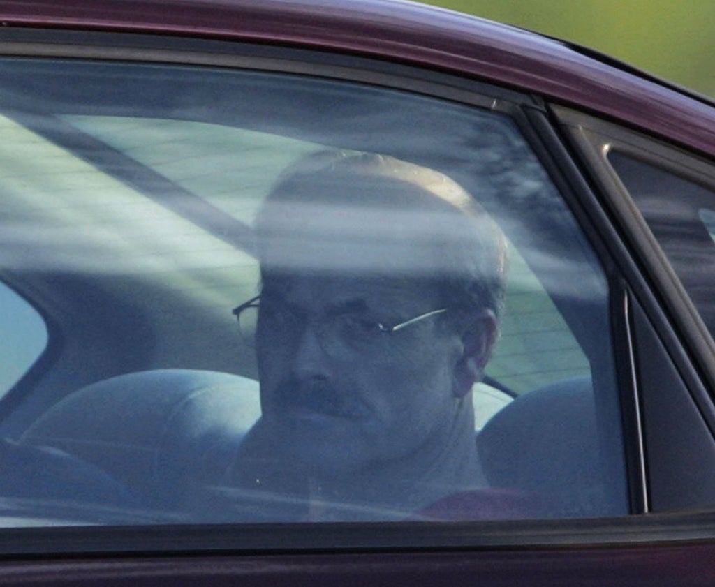 Dennis Rader is escorted into the El Dorado Correctional Facility on August 19, 2005 in El Dorado, Kansas