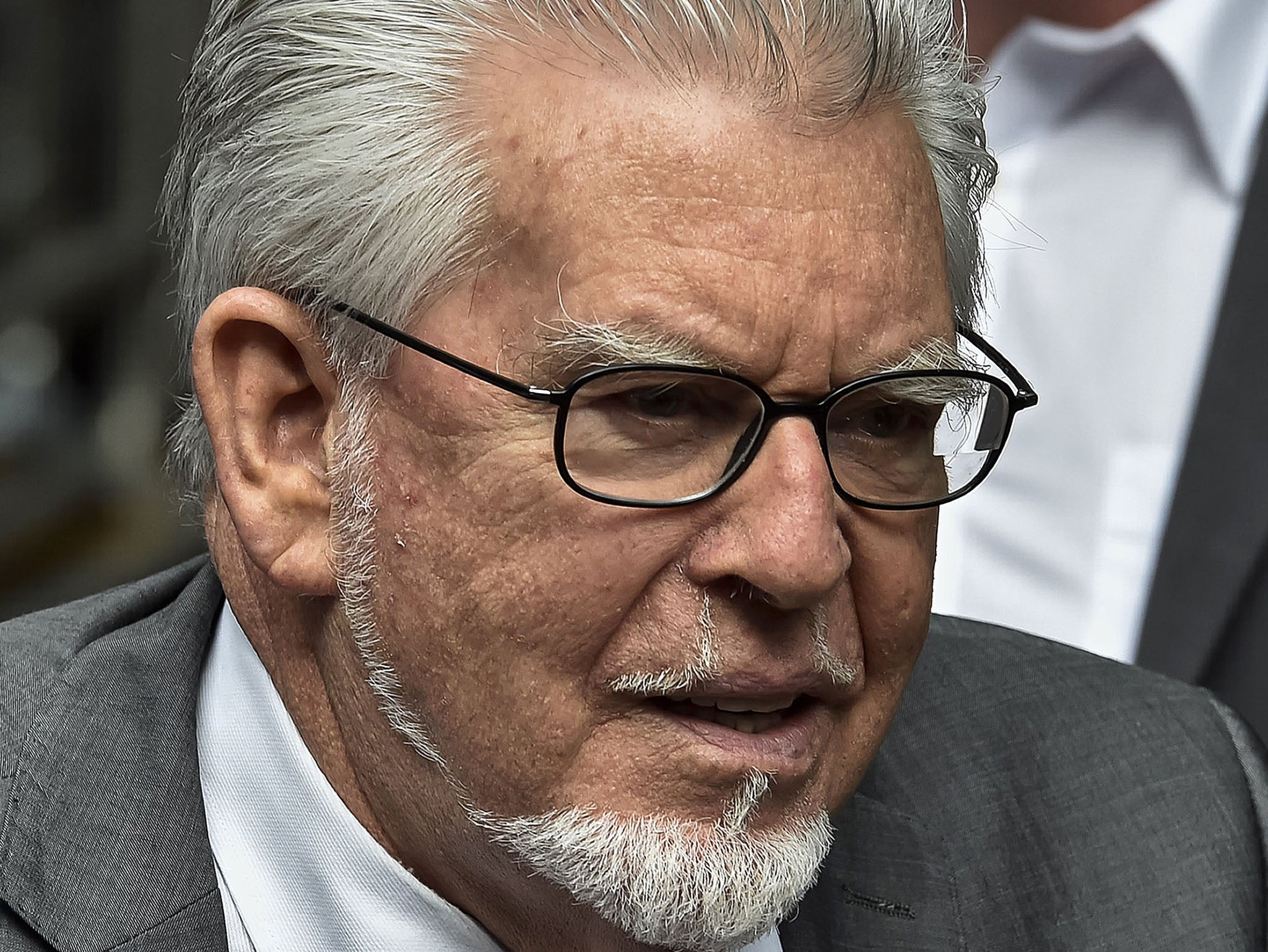 Rolf Harris arrives at Southwark Crown Court in central London on 4 July
