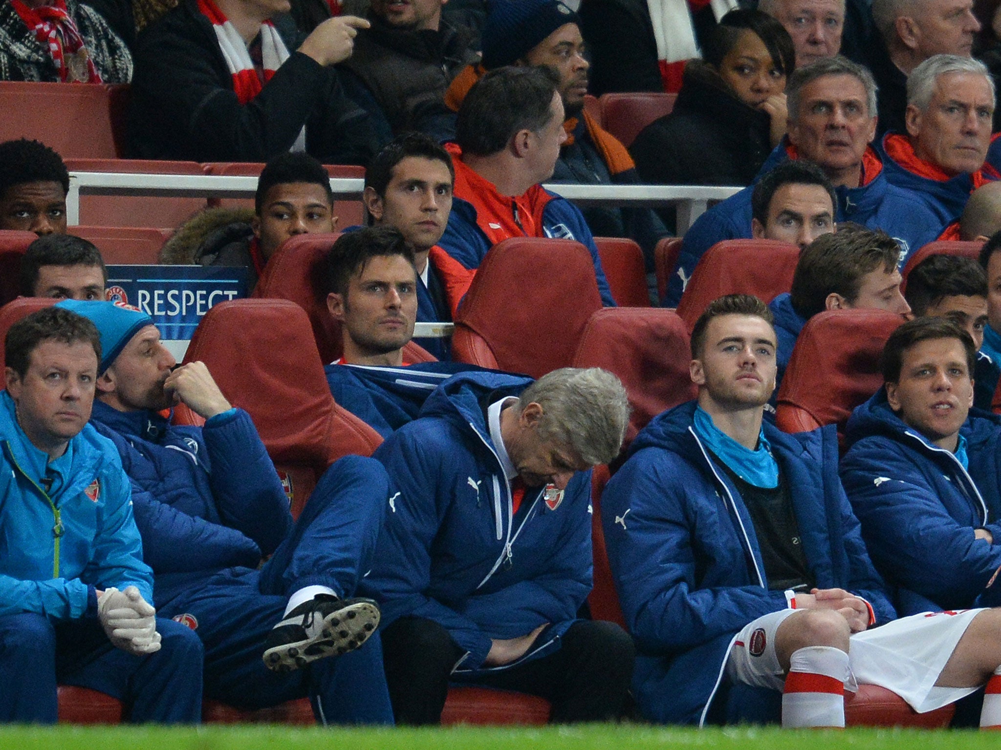 Arsene Wenger can't bear to look as his Arsenal side slump to a 3-1 defeat