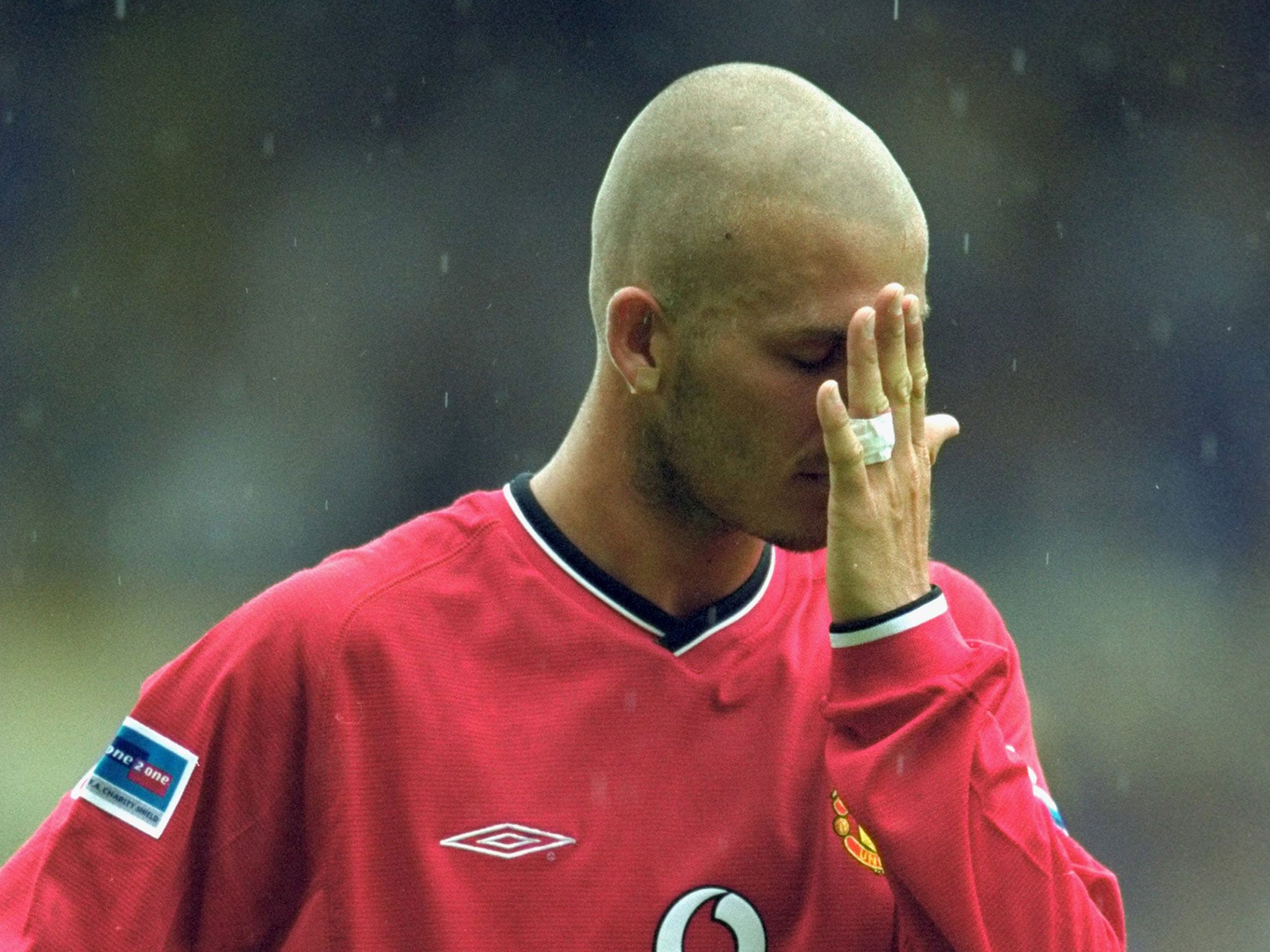 David Beckham pictured with his freshly shaven head during the 2000 Charity Shield