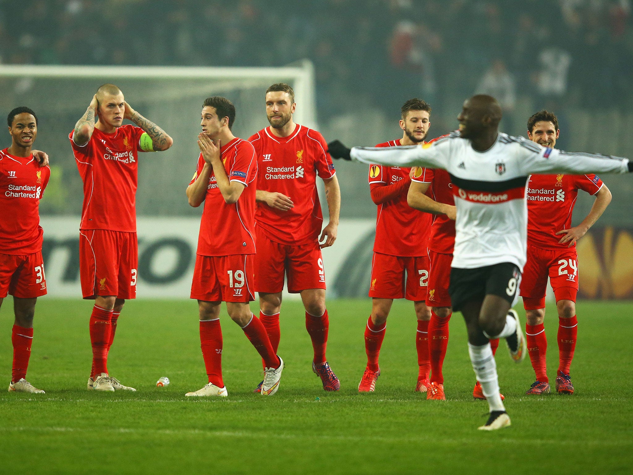 Demba Ba (right) celebrates after Besiktas win on penalties