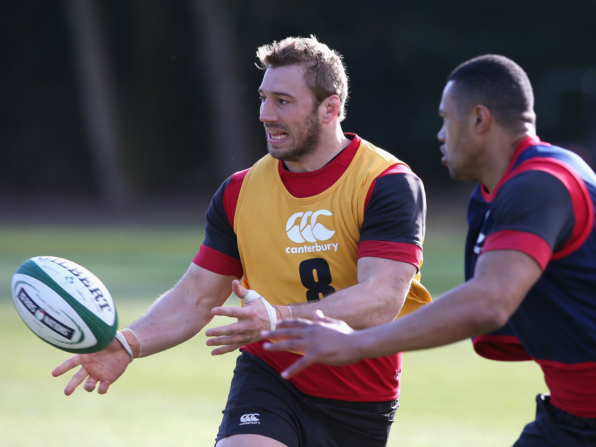 Chris Robshaw passes the ball during training at Pennyhill Park