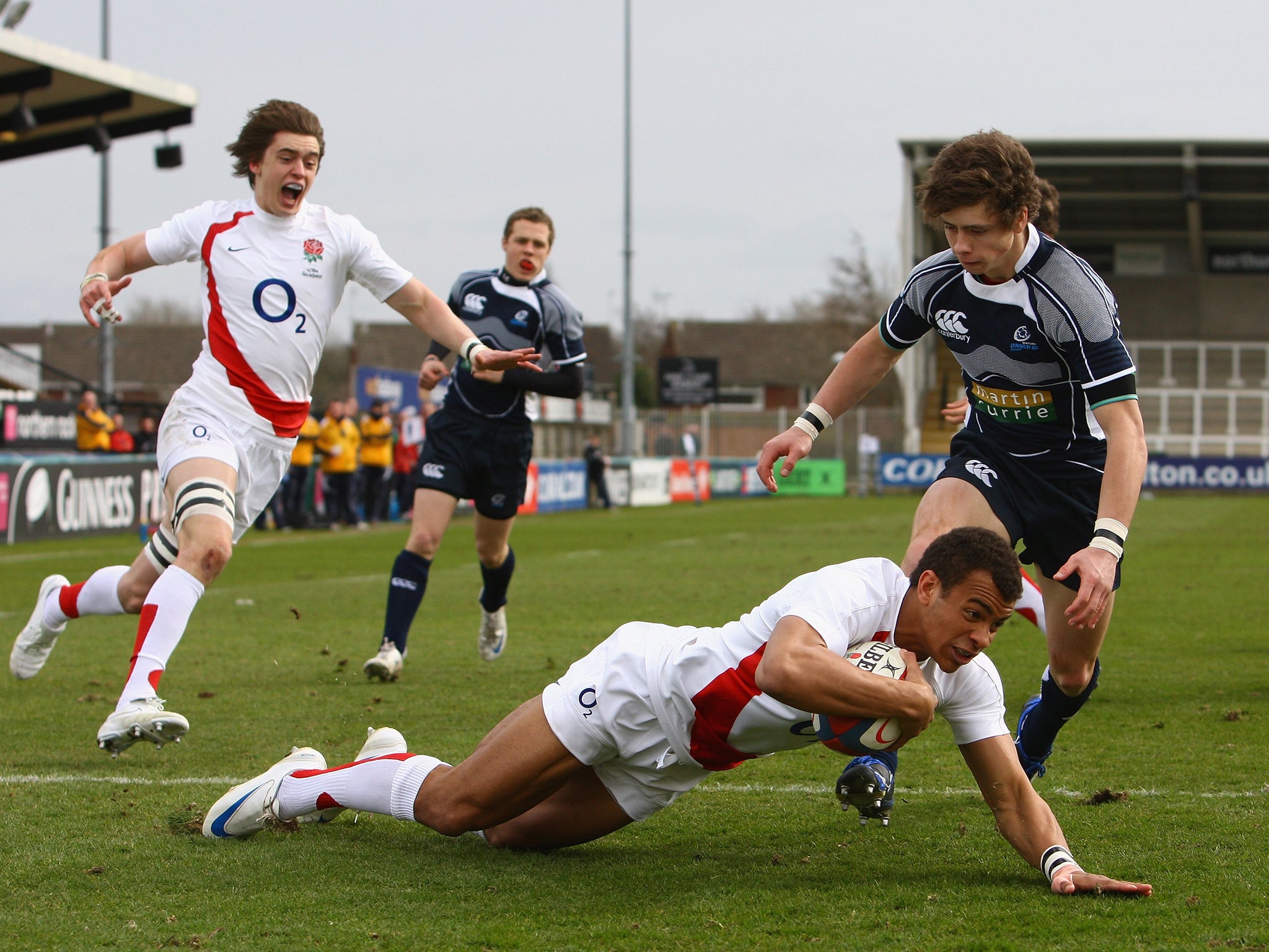 Jonathan Joseph scores a try for England in an Under-18 match against Scotland at
Kingston Park in 2009