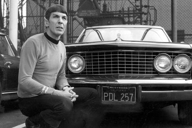 Leonard Nimoy in his 'Spock' costume with his Buick Riviera, 1965.