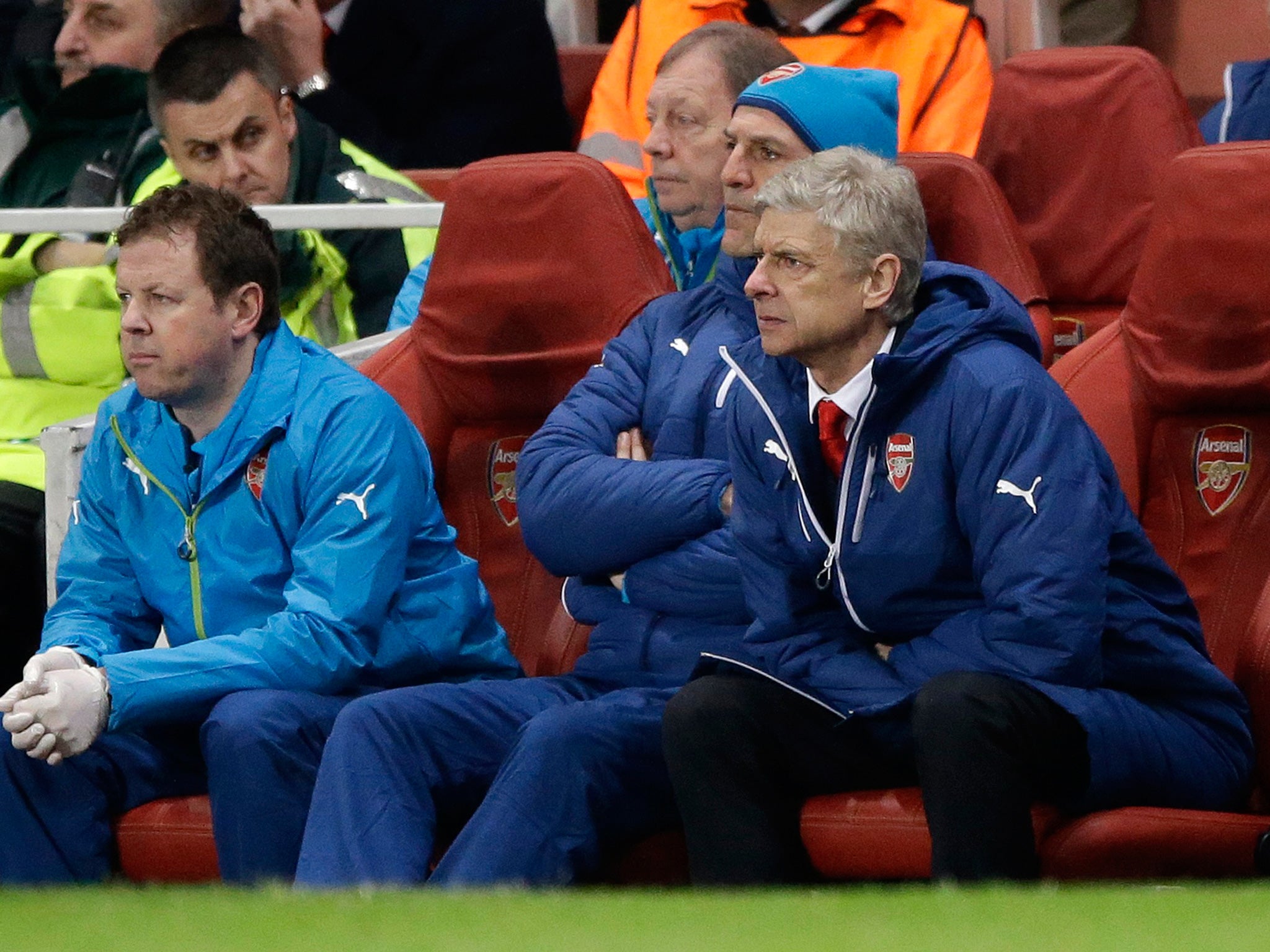 Arsène Wenger watches the painful defeat to Monaco